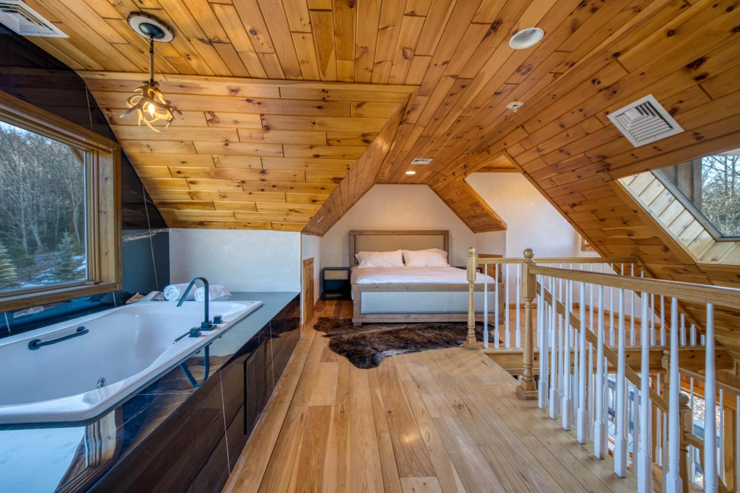 Photo of the whole room, Bed in The Haüs Windham - Spacious Suites, Hot Tub, Mountain Views!