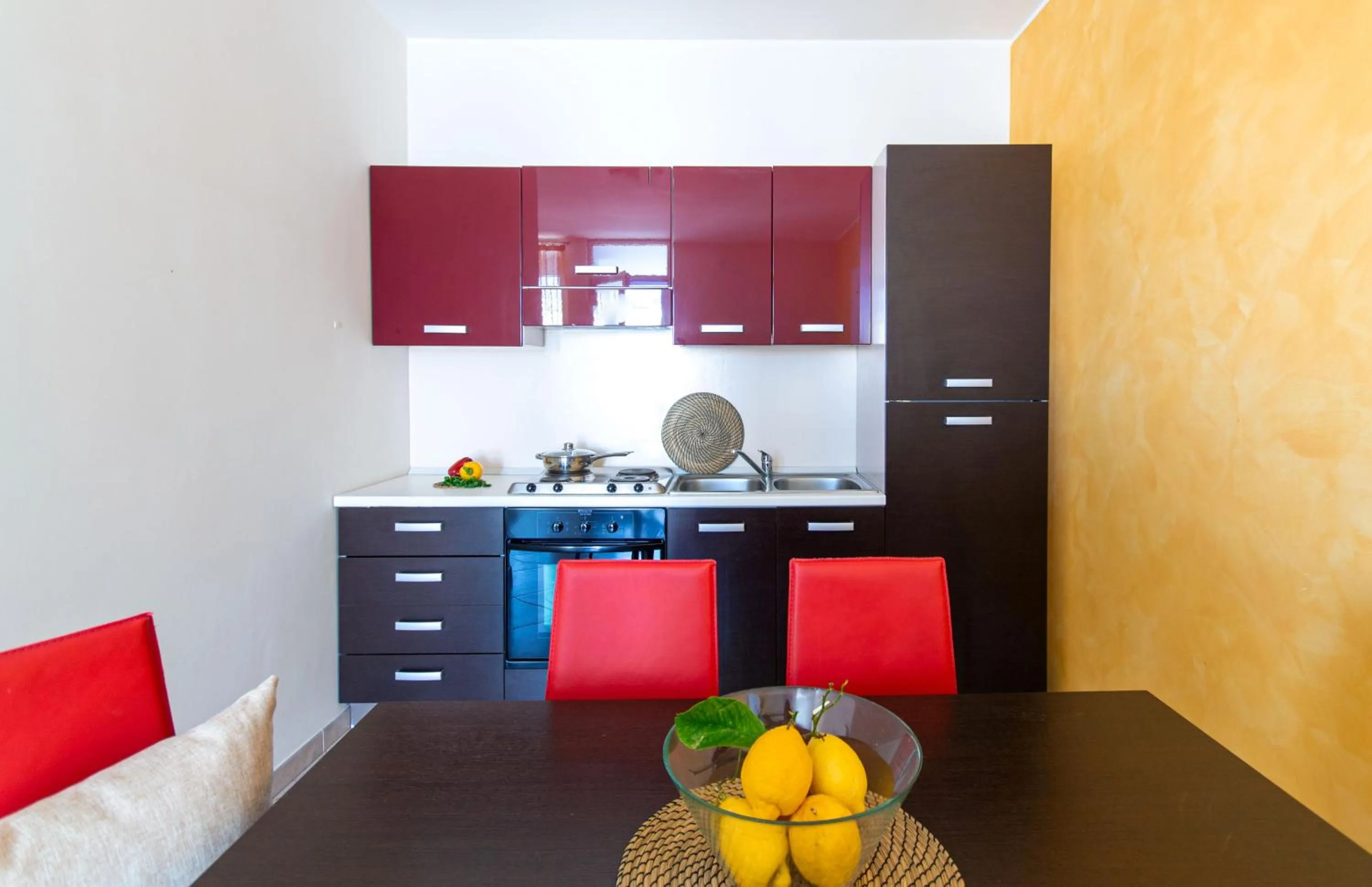 Kitchen or kitchenette in Residence Borgo & Mare - Localo