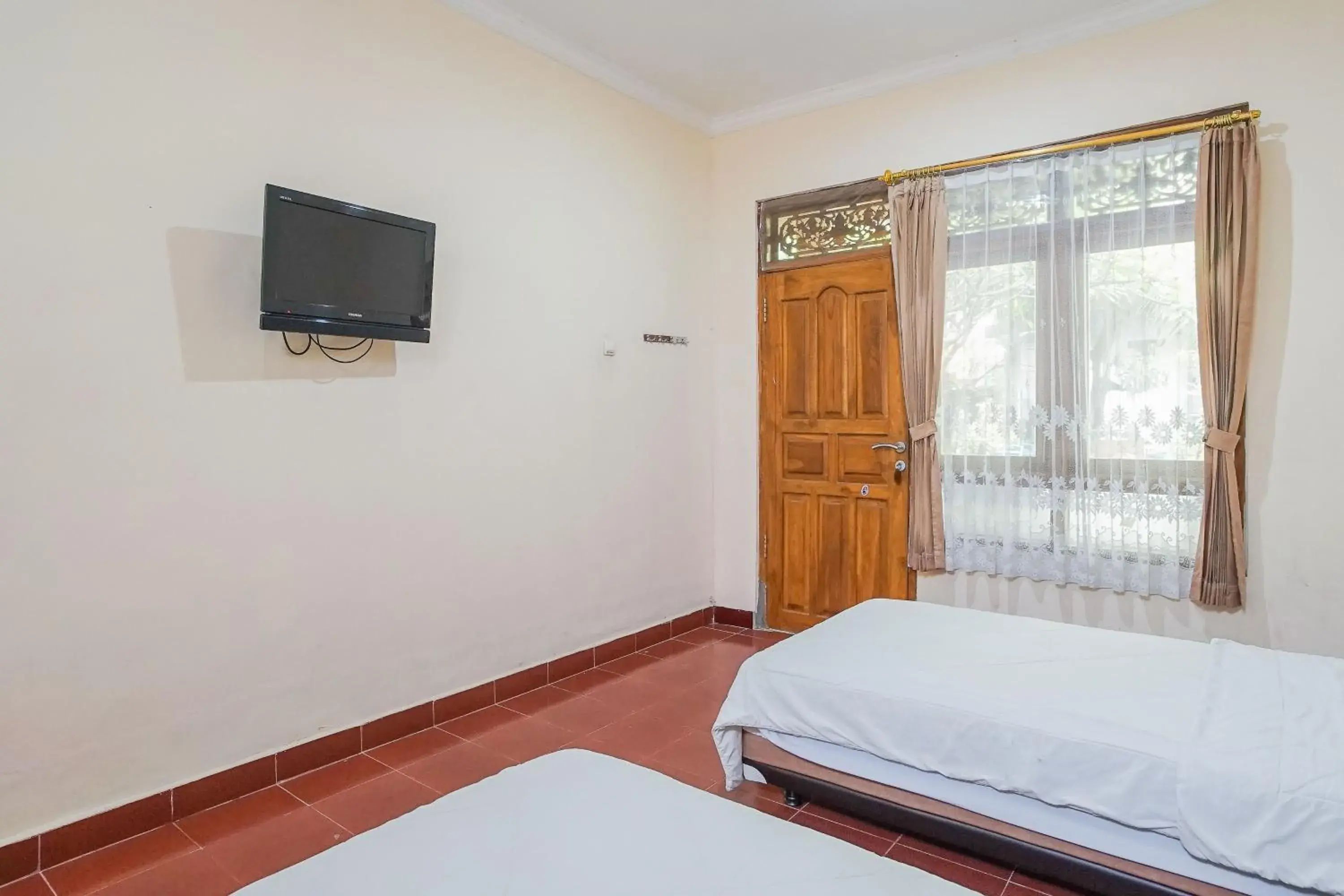 Photo of the whole room, Bed in Mahendra Beach Inn Photo of the whole room, Bed in Mahendra Beach Inn