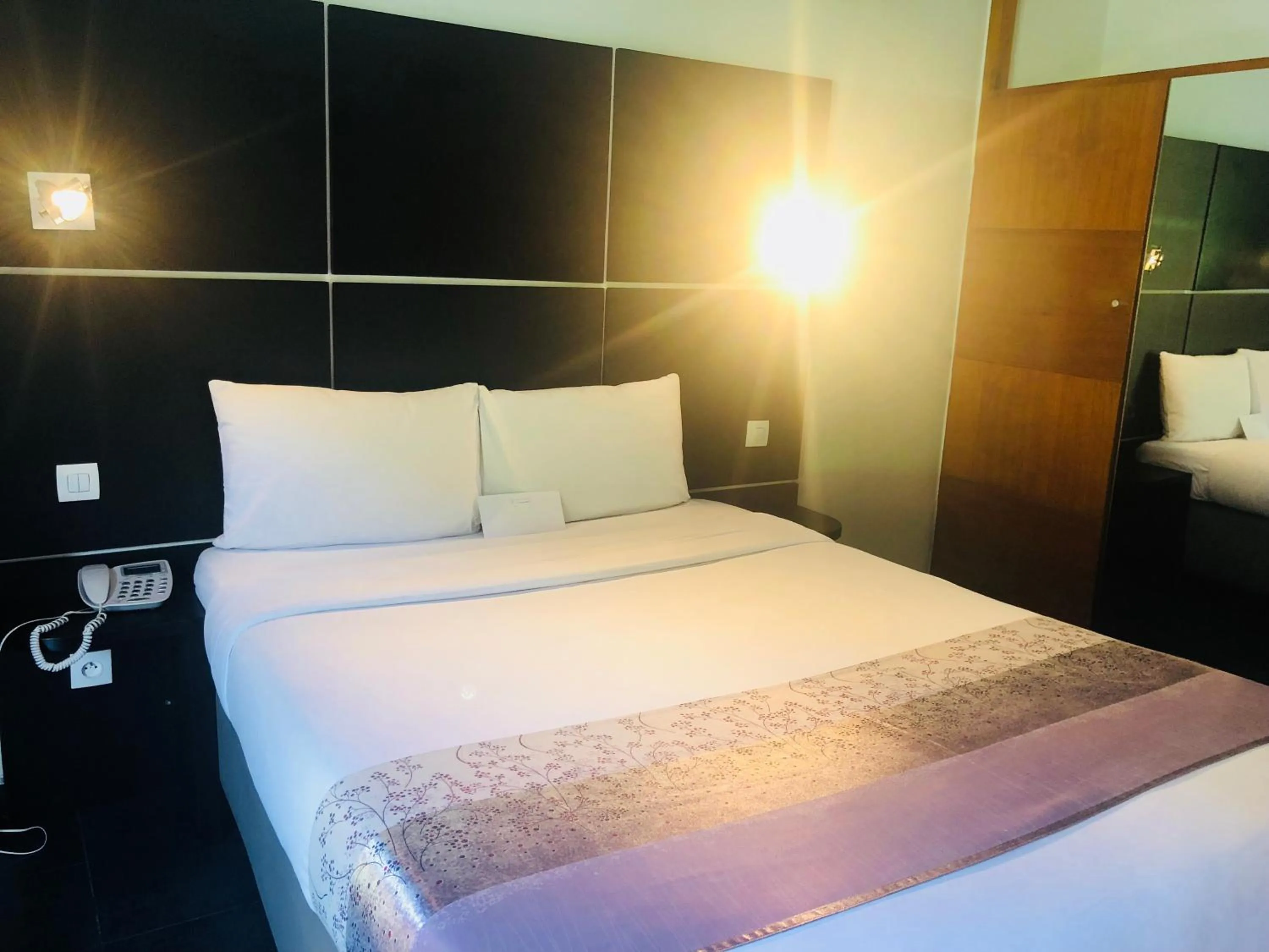 Bed in Détente Hôtel