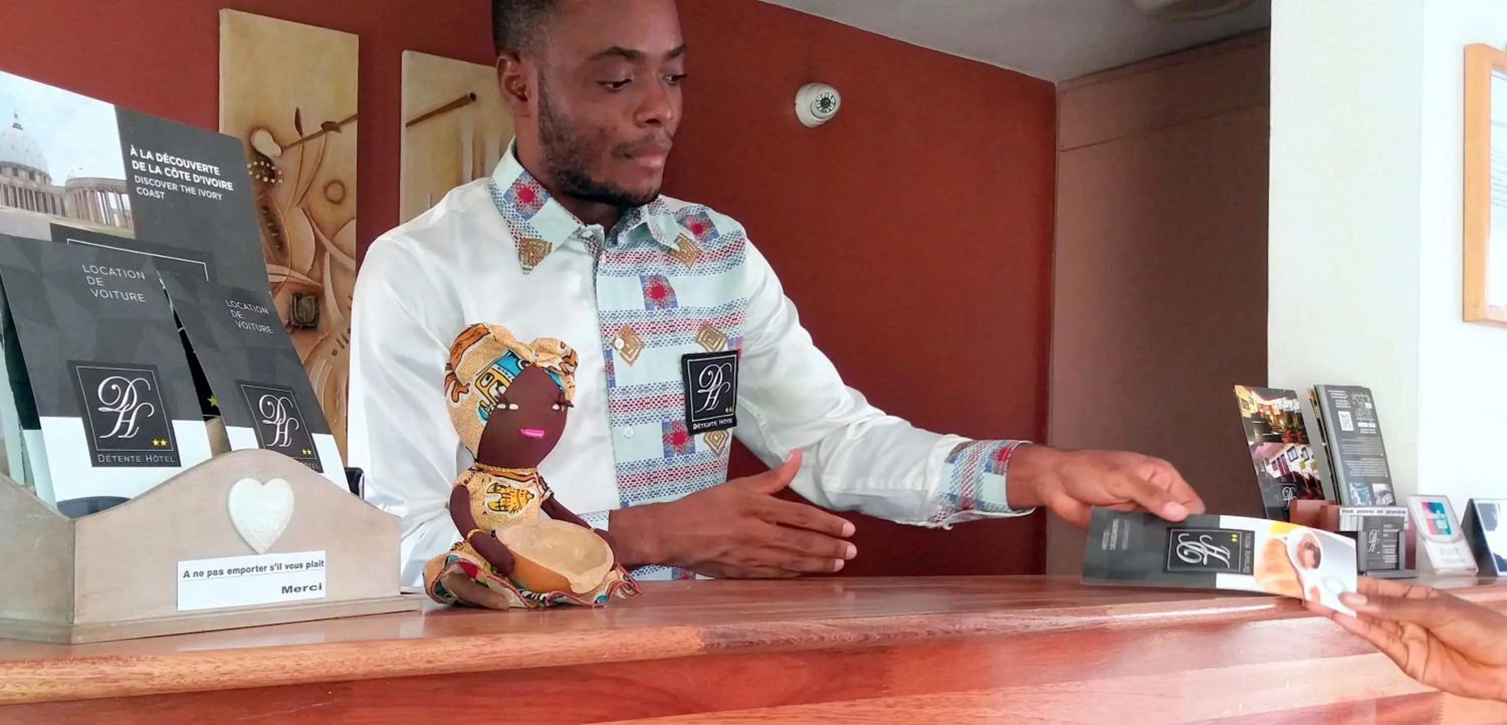 Lobby or reception in Détente Hôtel