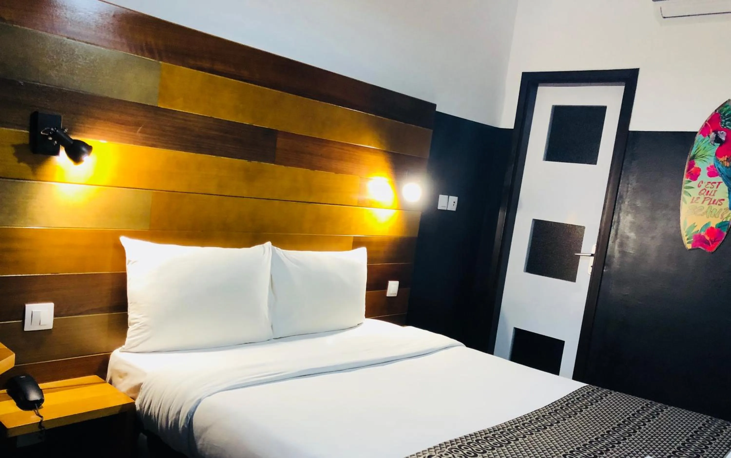 Bed in Détente Hôtel