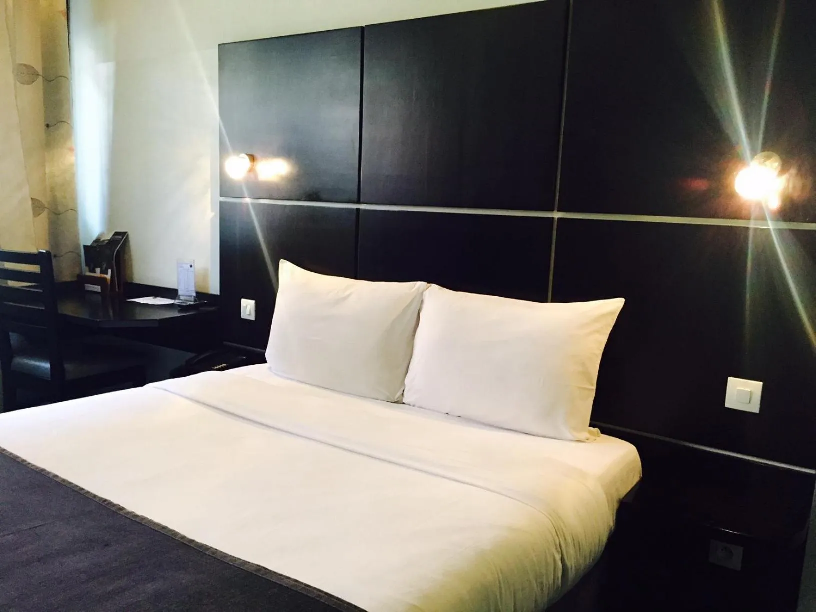 Bed in Détente Hôtel