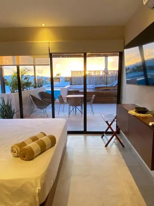 Balcony/Terrace, Swimming Pool in Cacao Tulum departamentos