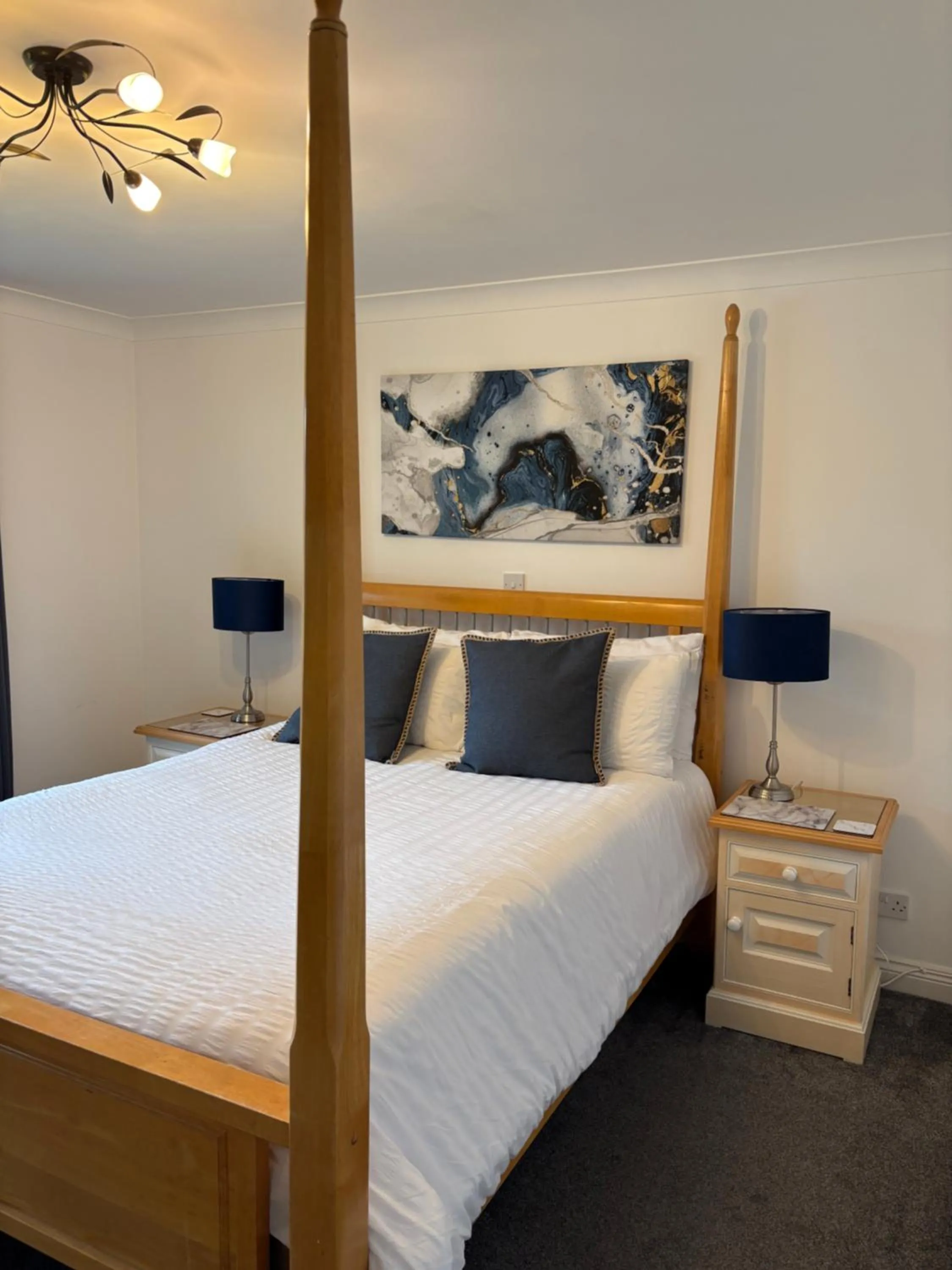 Bed in The Albany Apartments