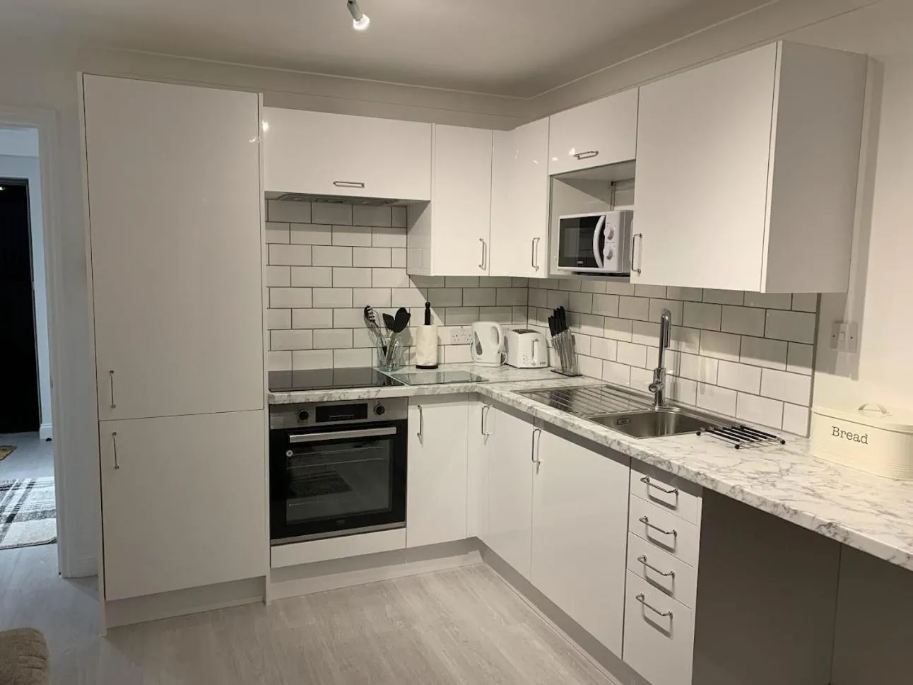 Kitchen or kitchenette in The Albany Apartments