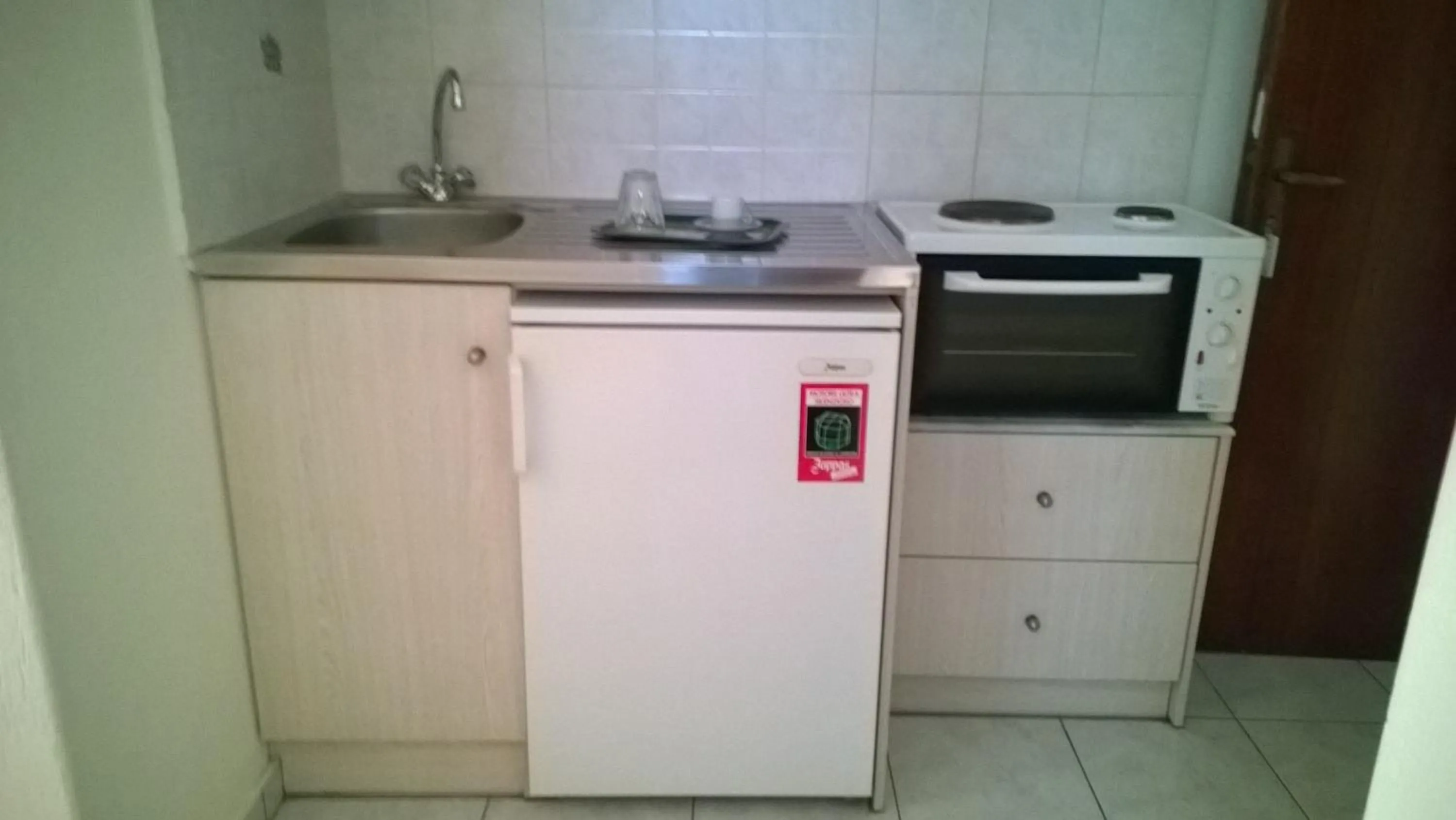 Kitchen or kitchenette in Mitrou Vasiliki Studios