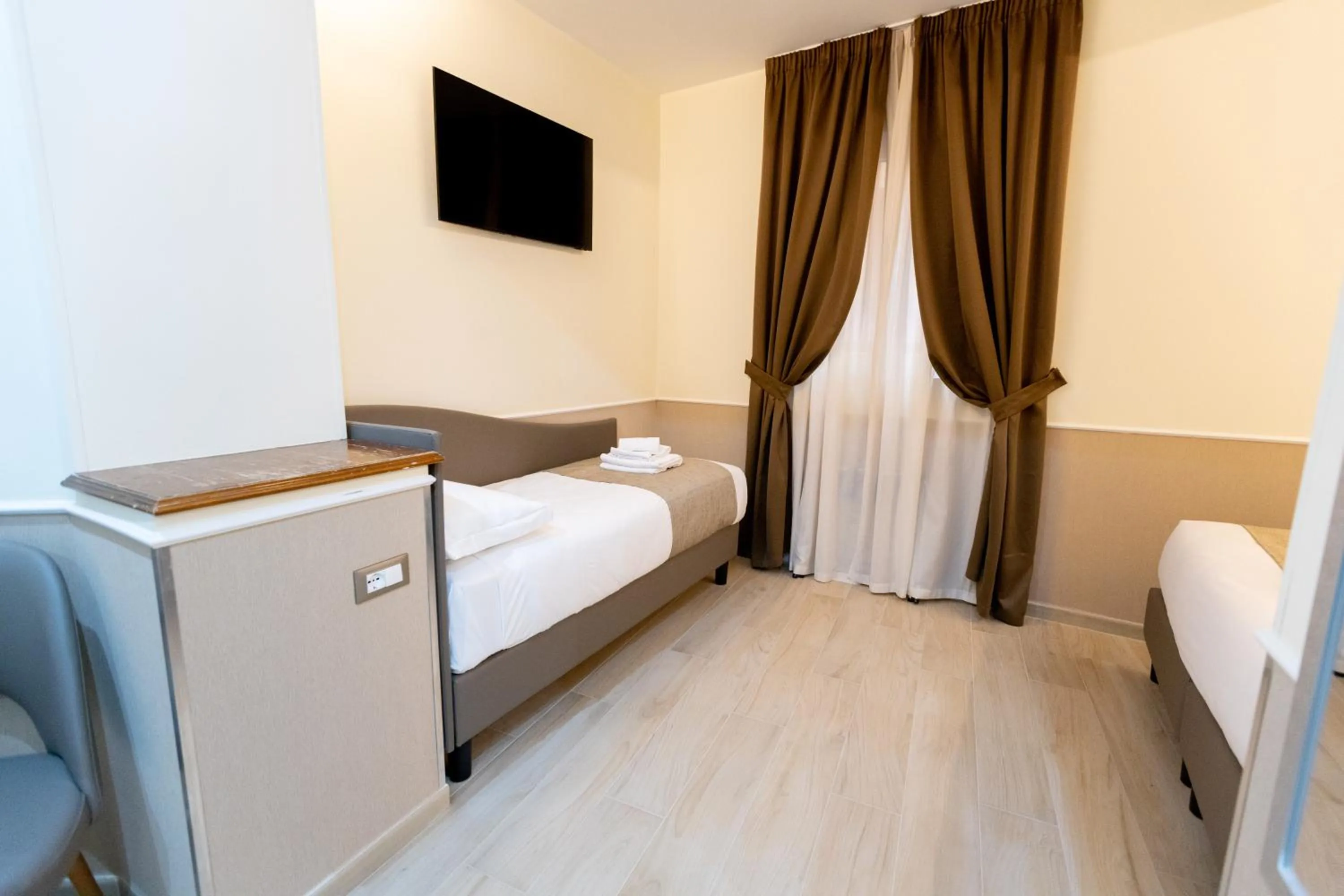 Bed in Hotel Maximus