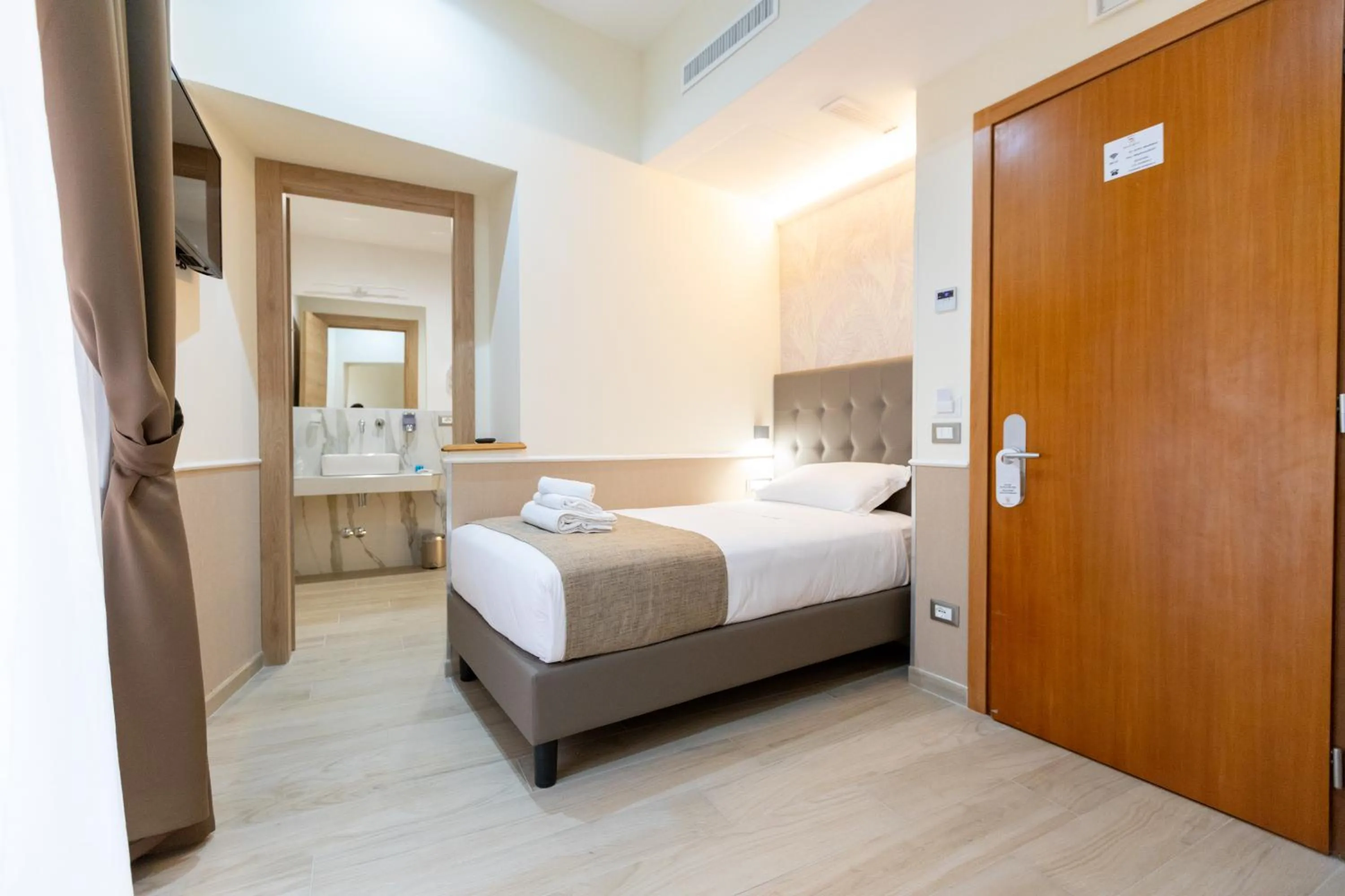 Bed in Hotel Maximus