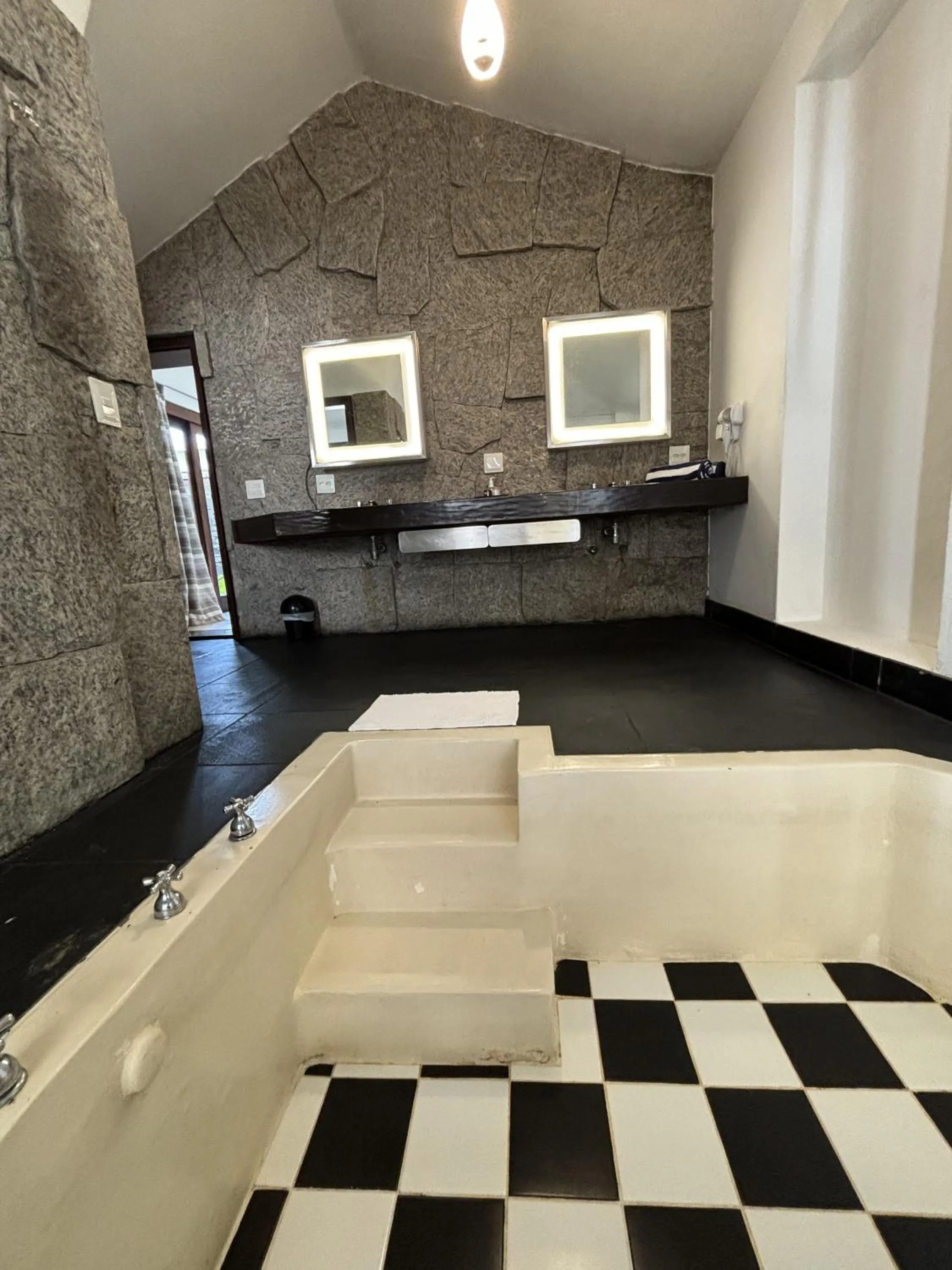 Bathroom in Les Jardins de Rio Boutique Hotel