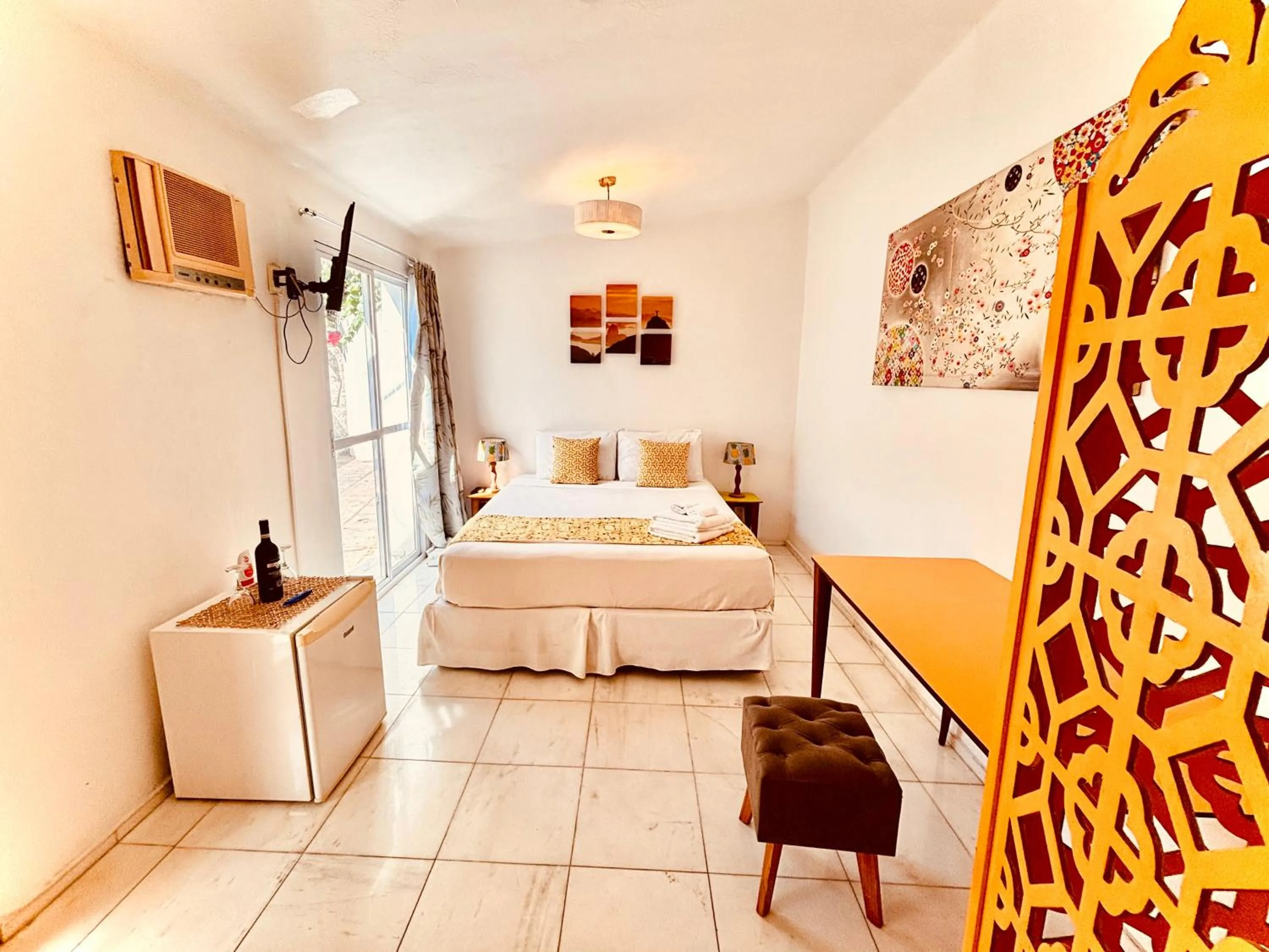 Bed in Les Jardins de Rio Boutique Hotel