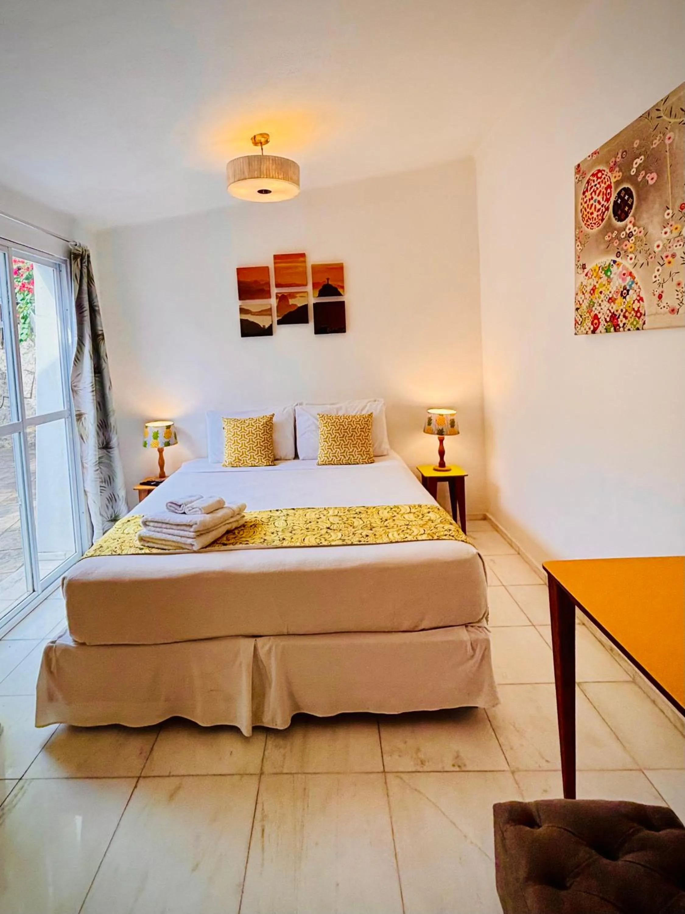 Bed in Les Jardins de Rio Boutique Hotel