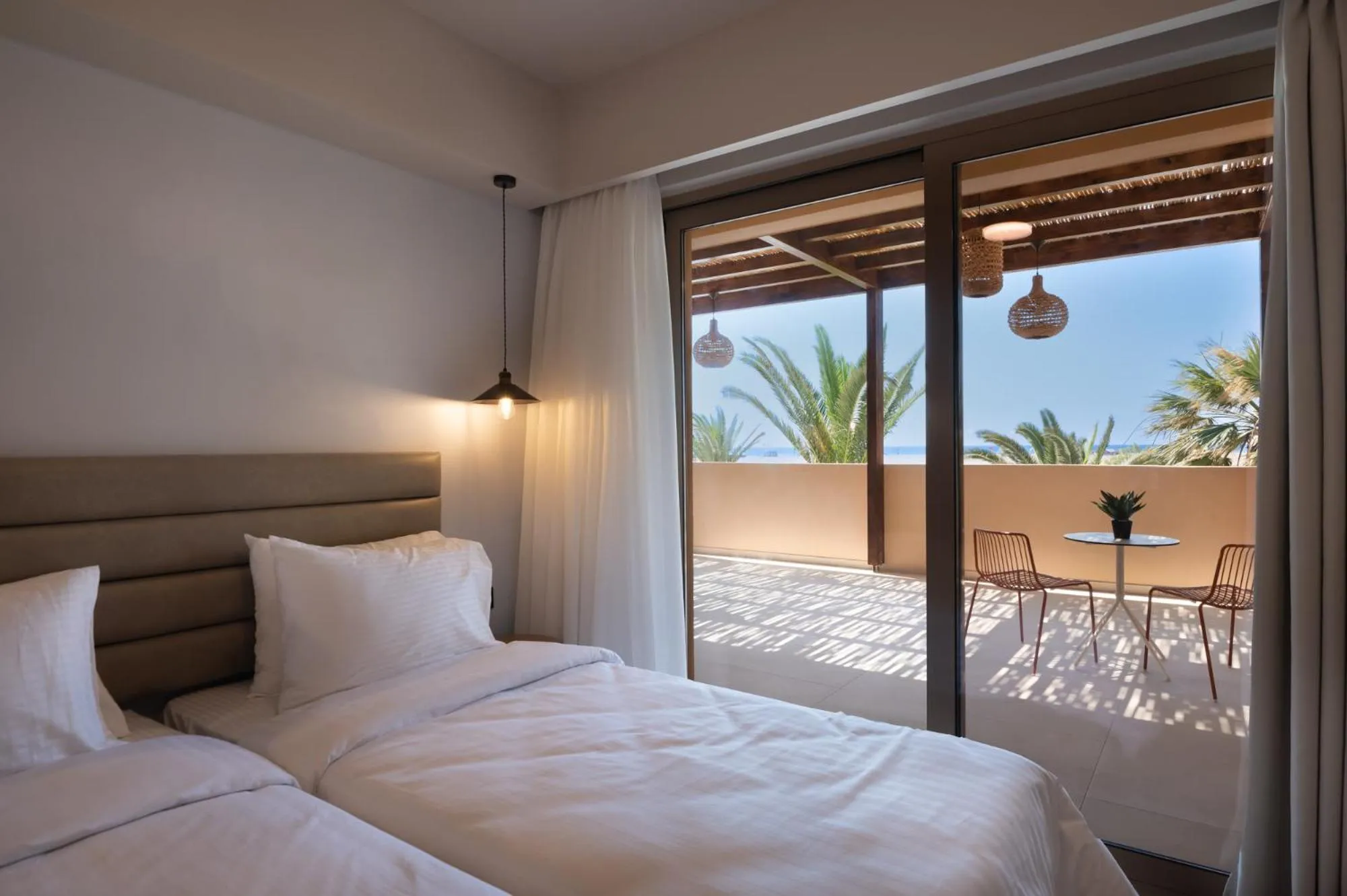 Bed in Prasonisi Light House Boutique Hotel