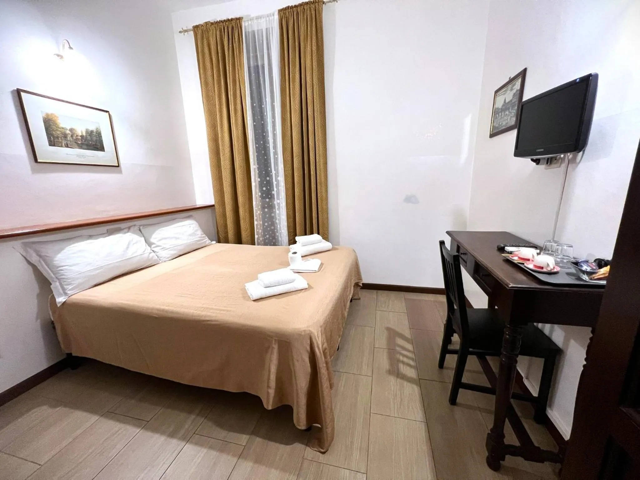 Photo of the whole room, Bed in Booking Inn Settembre 95