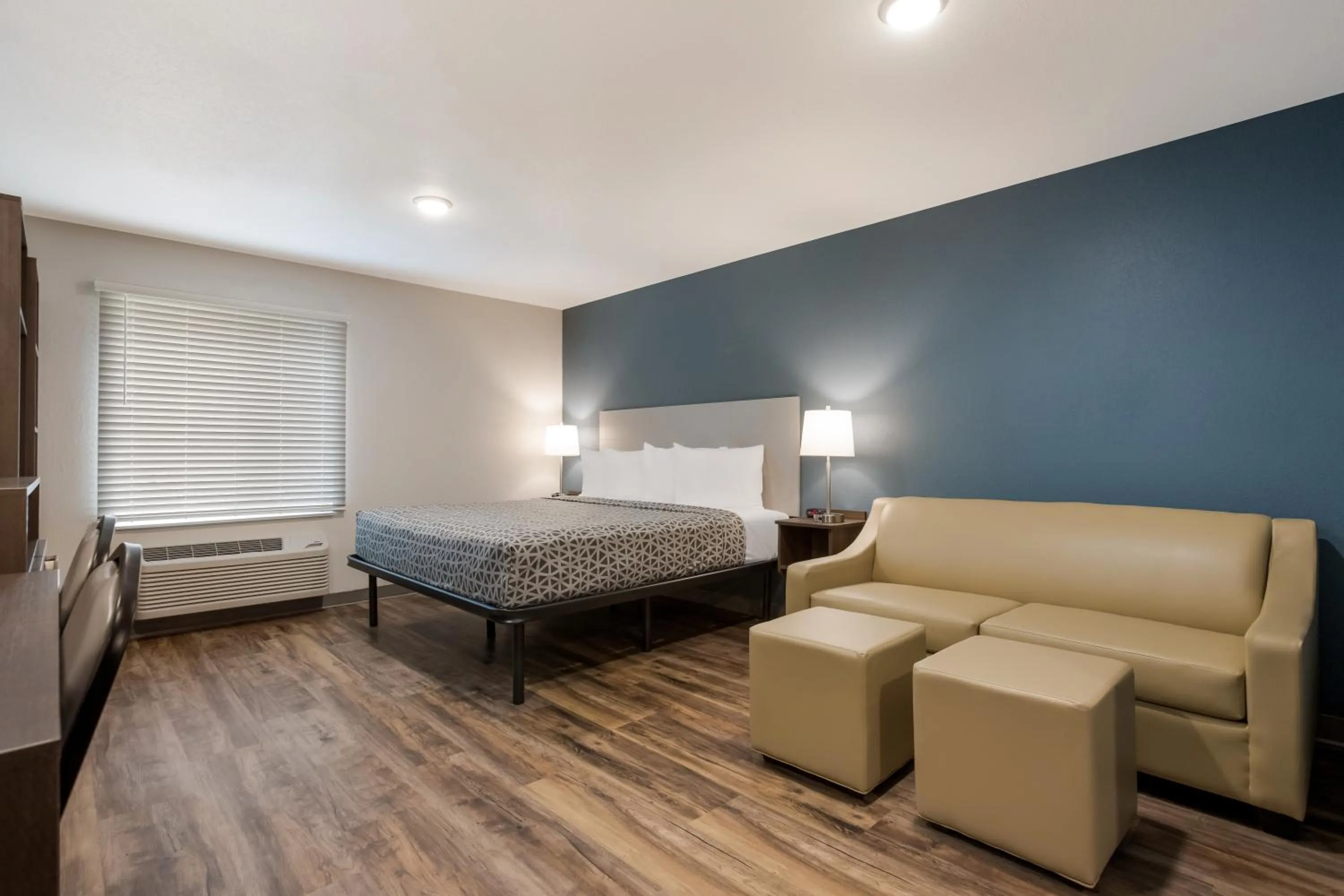 Bedroom, Bed in WoodSpring Suites Corona