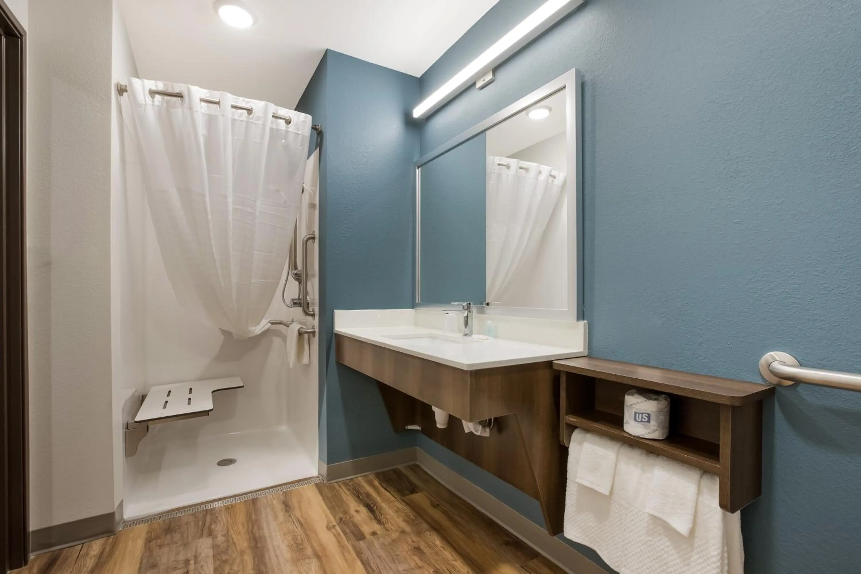 Bathroom in WoodSpring Suites Corona