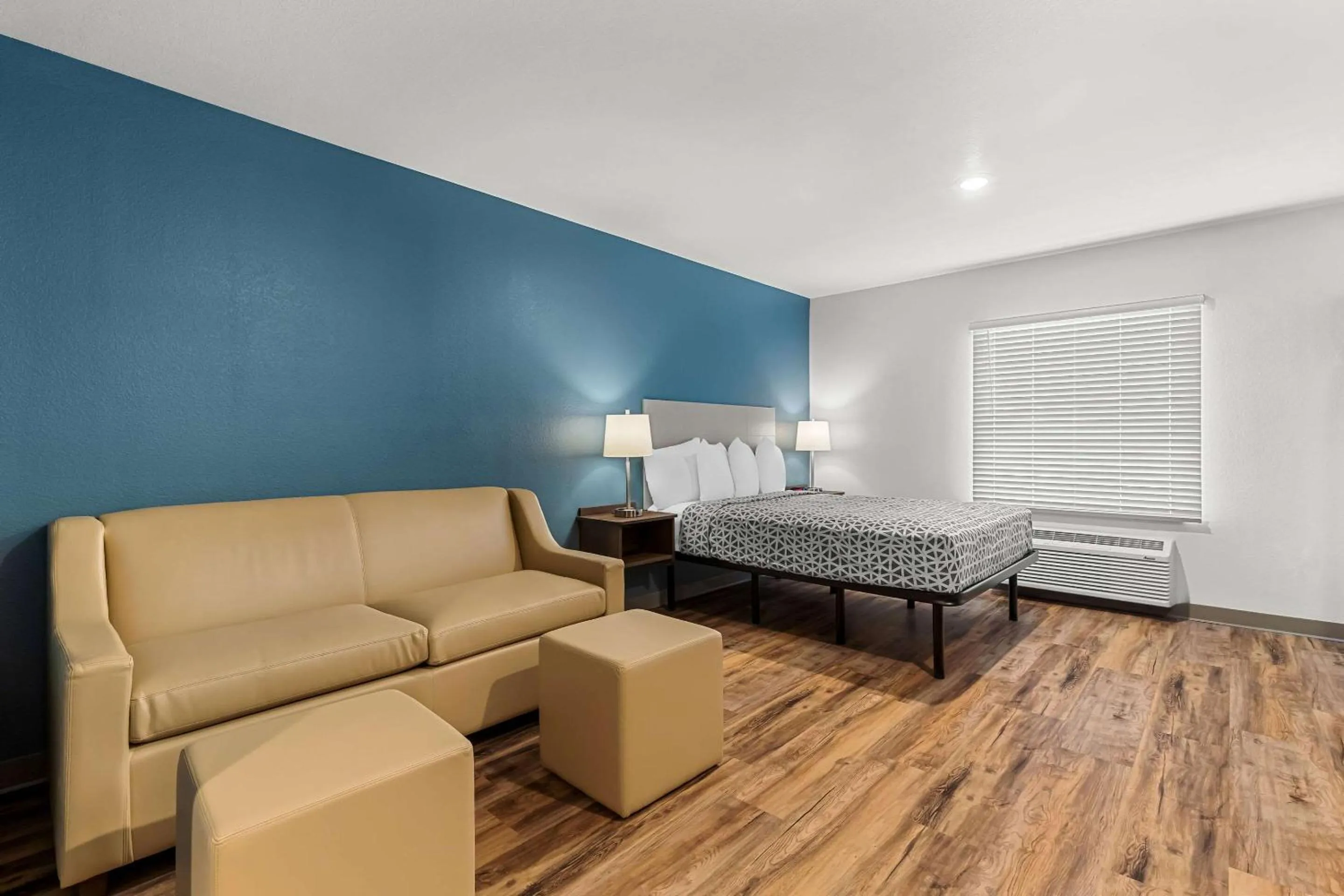 Bedroom, Bed in WoodSpring Suites Corona