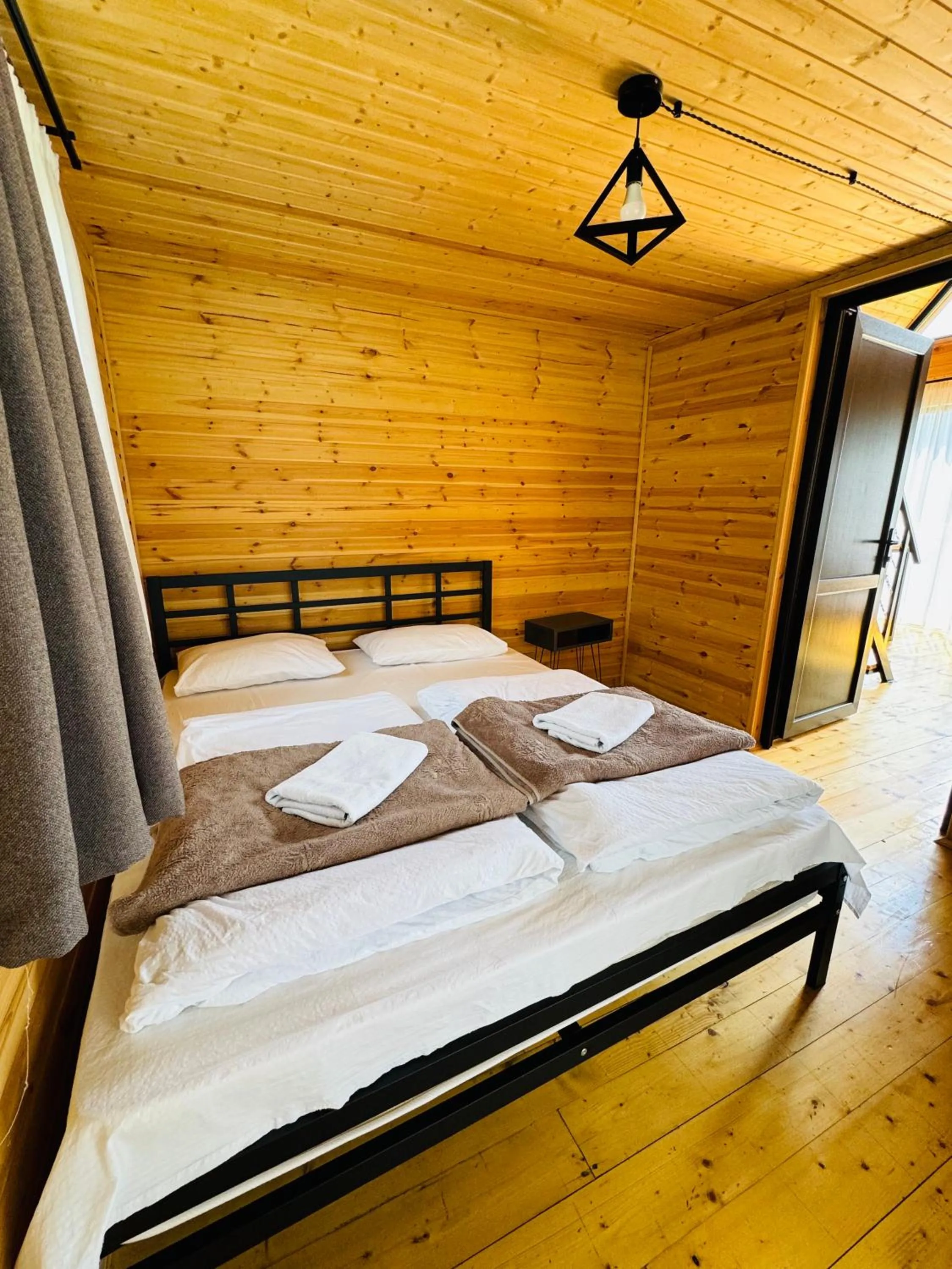 Bed in Traveler's Cottages in Kazbegi