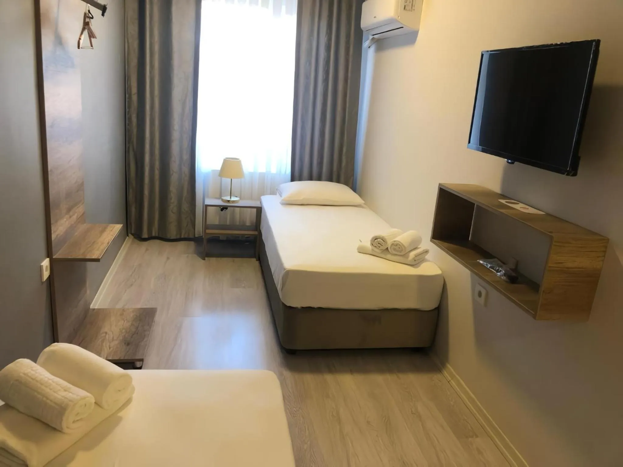 Communal lounge/ TV room, Bed in Rinascente