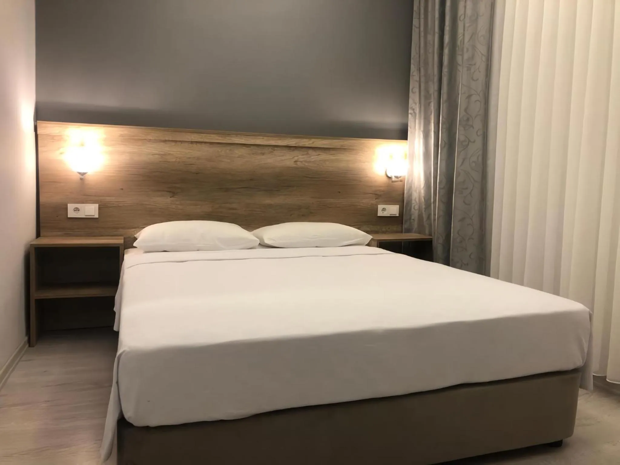 Communal lounge/ TV room, Bed in Rinascente