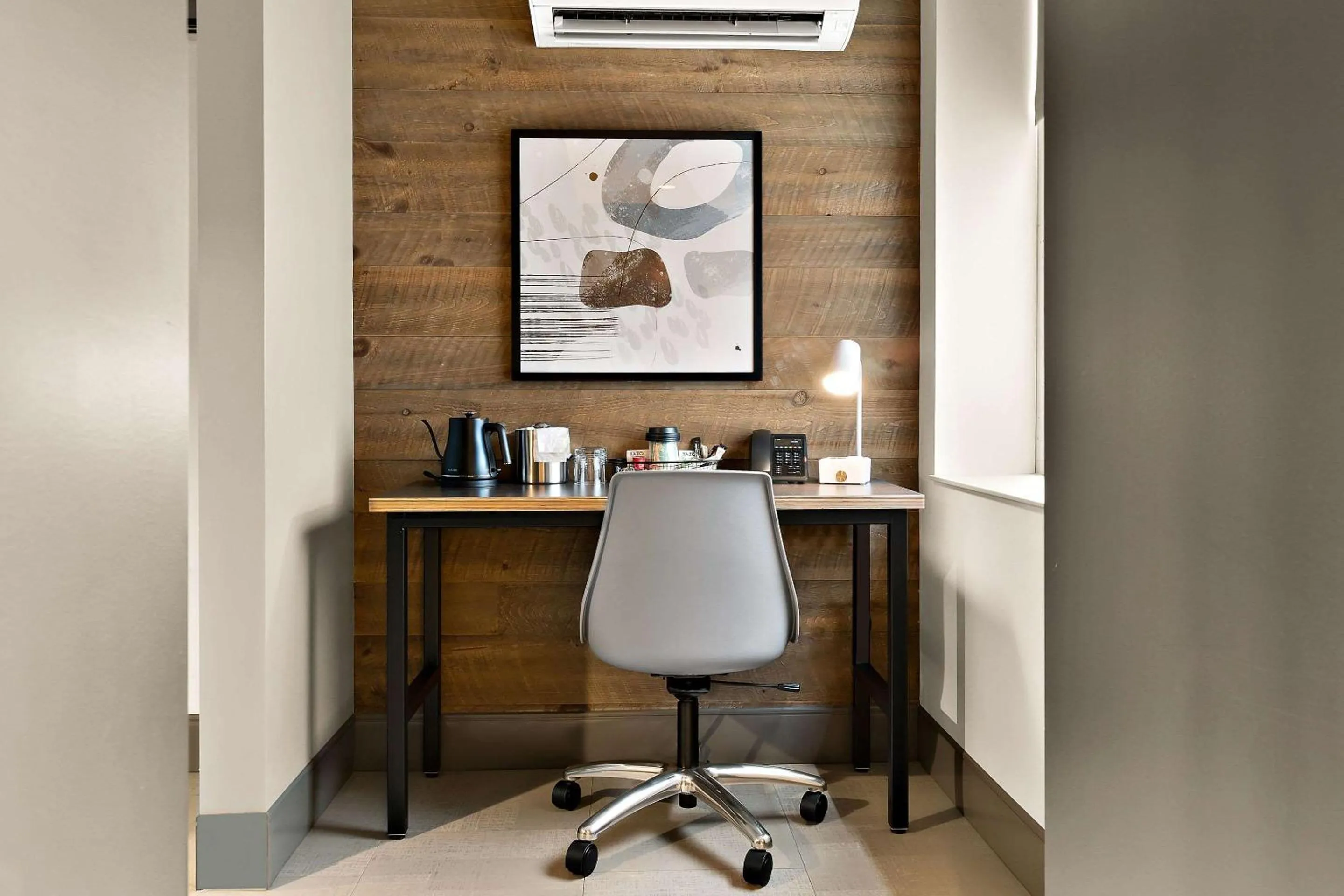 Bedroom in CityFlatsHotel - Port Huron, an Ascend Collection Hotel