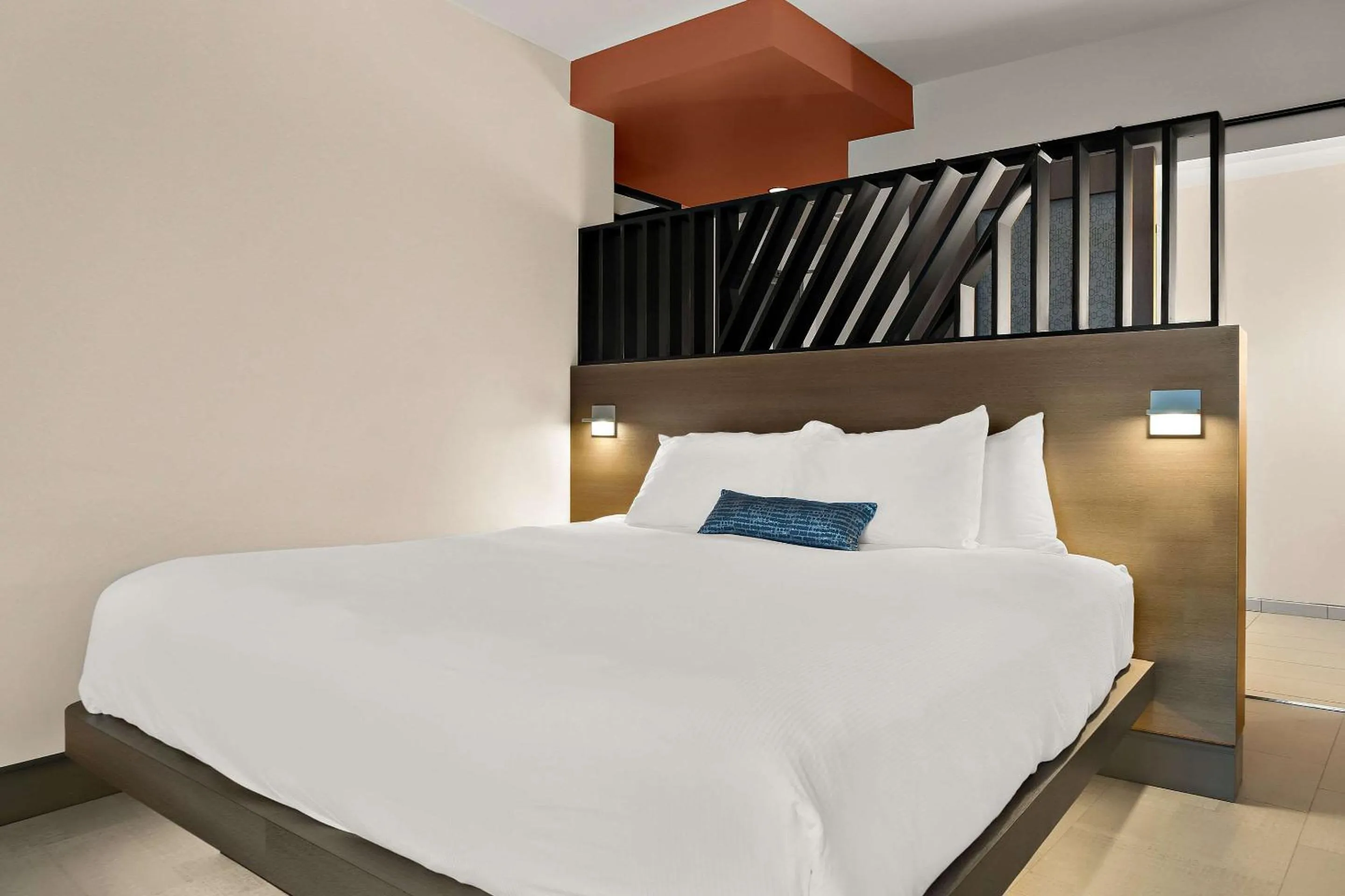 Bedroom in CityFlatsHotel - Port Huron, an Ascend Collection Hotel