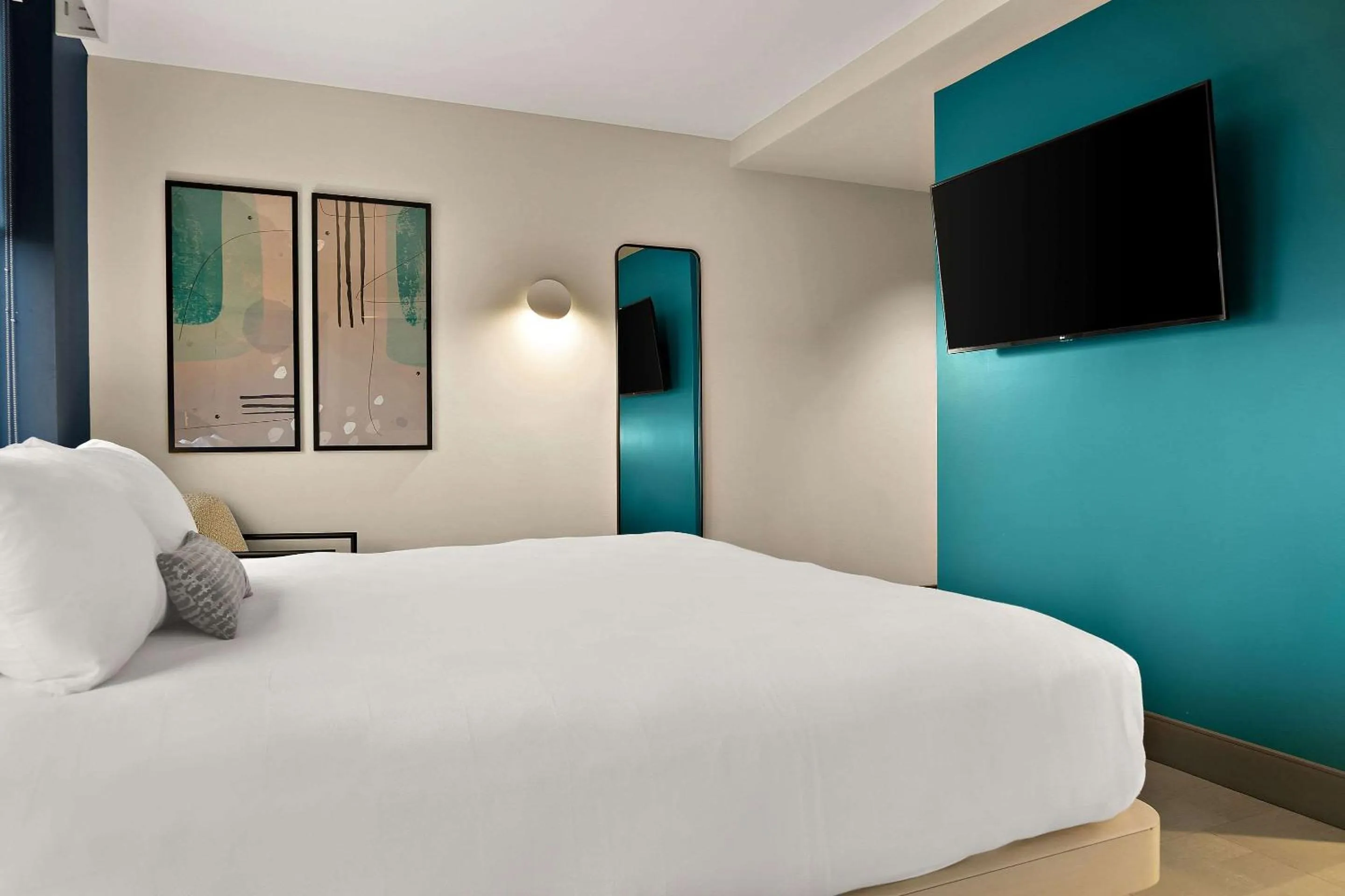 Bedroom in CityFlatsHotel - Port Huron, an Ascend Collection Hotel