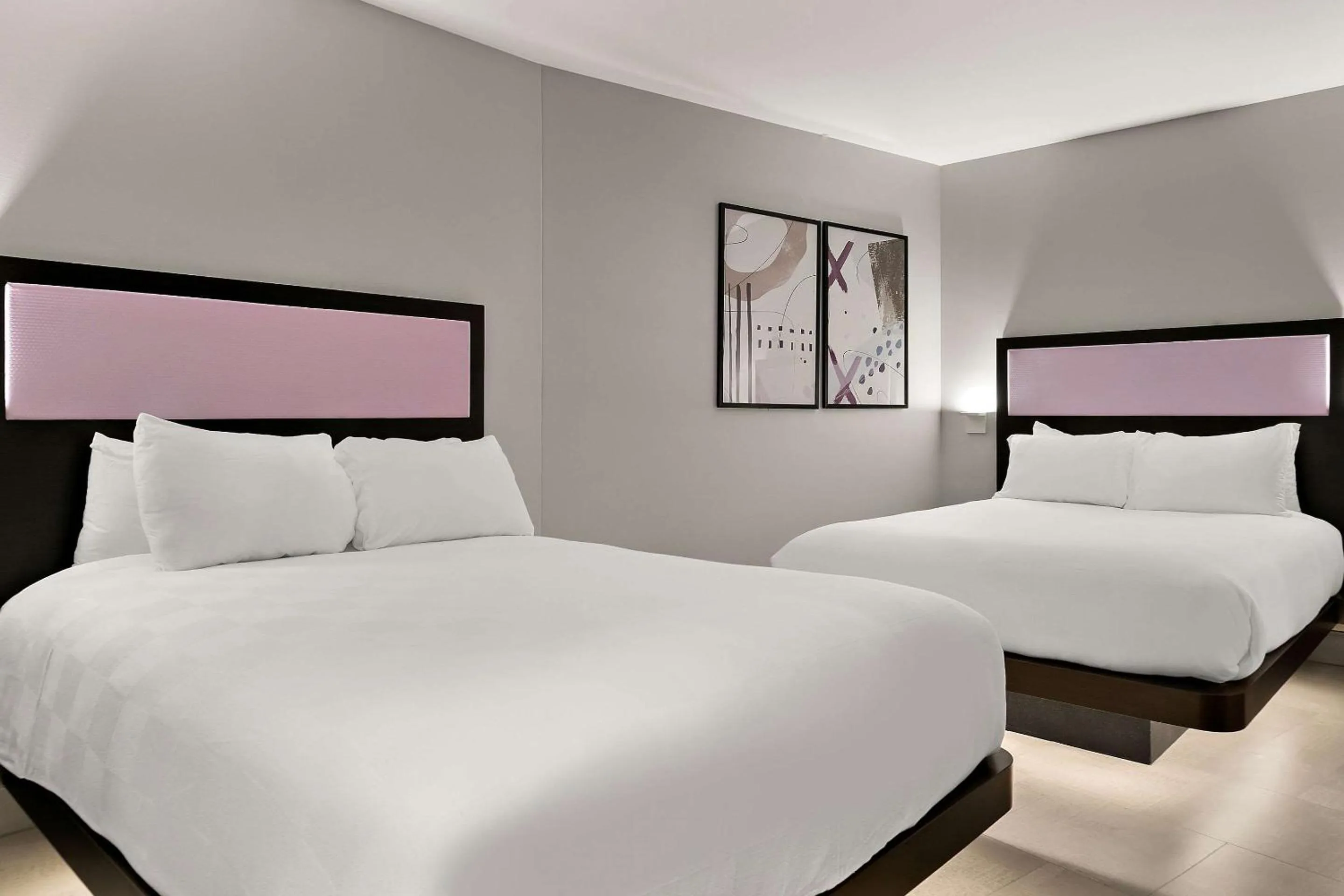 Bedroom in CityFlatsHotel - Port Huron, an Ascend Collection Hotel