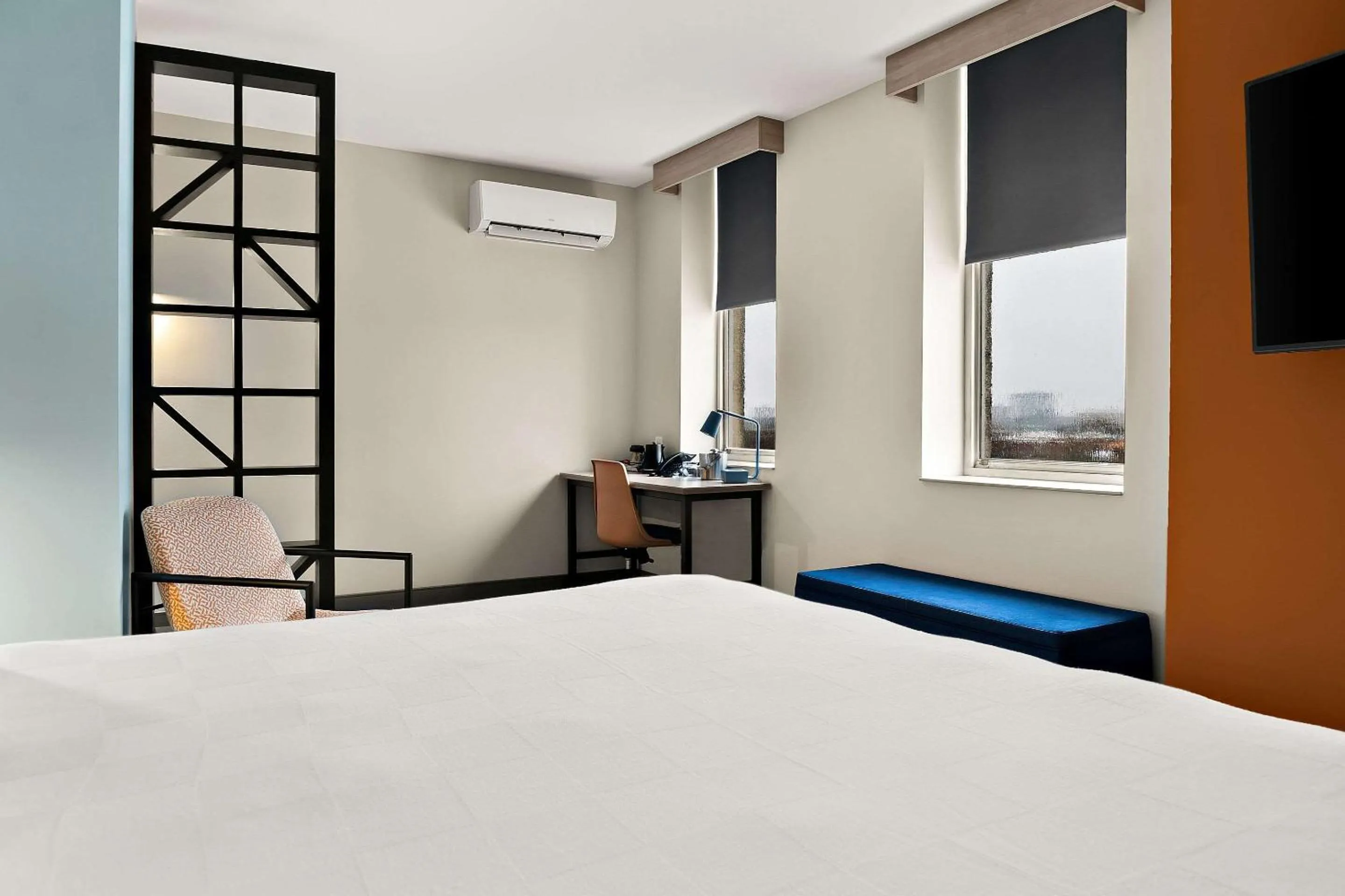 Bedroom in CityFlatsHotel - Port Huron, an Ascend Collection Hotel