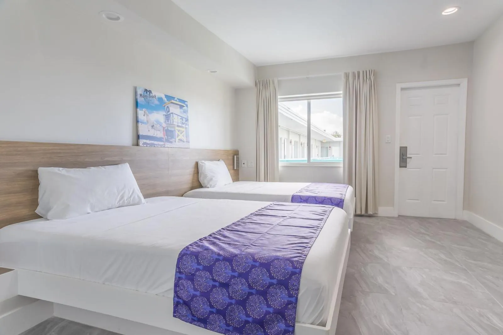 Bed in The Biscayne Hotel