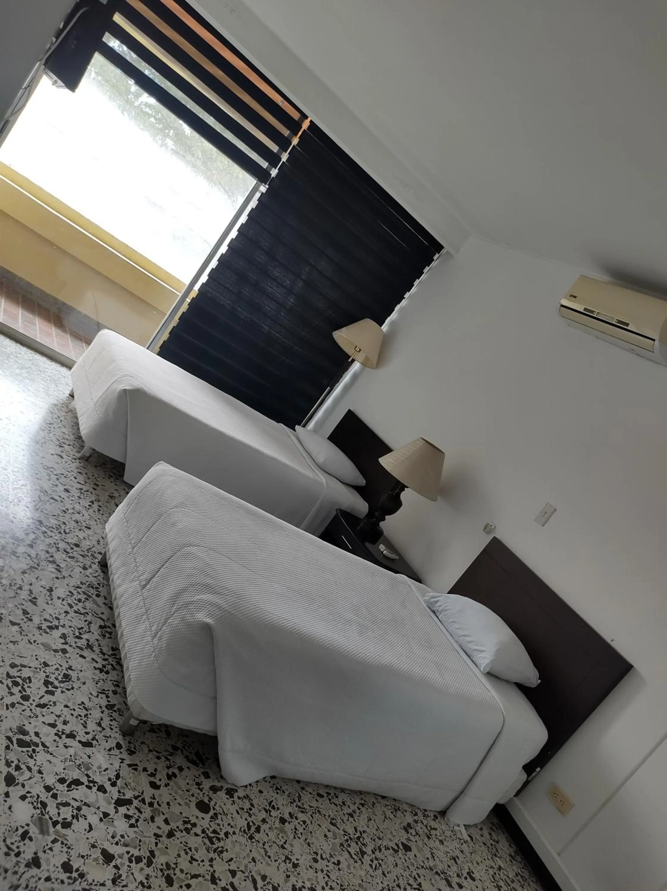 Bed in Hotel Estación by Destino Pacifico