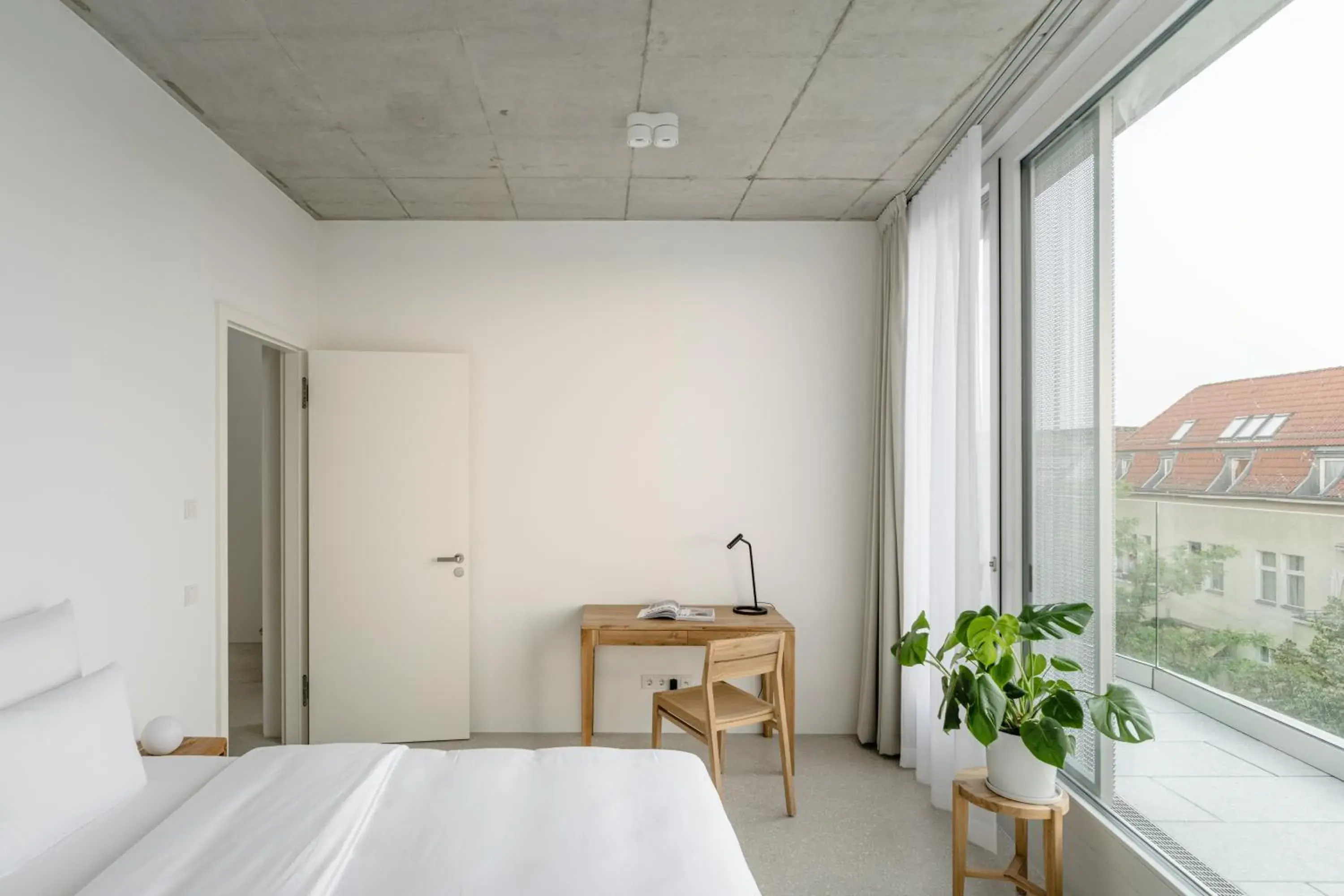 Bed in Carlotta Apartments Bed in Carlotta Apartments