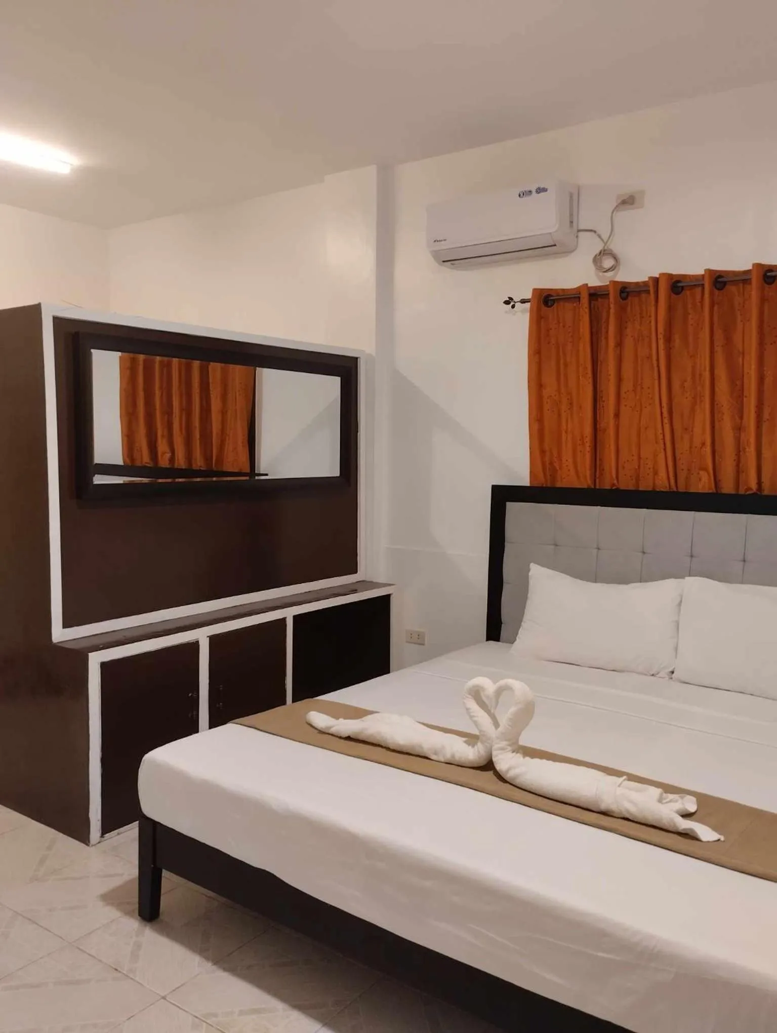 Bed in CHIISAI NATSU RESORT