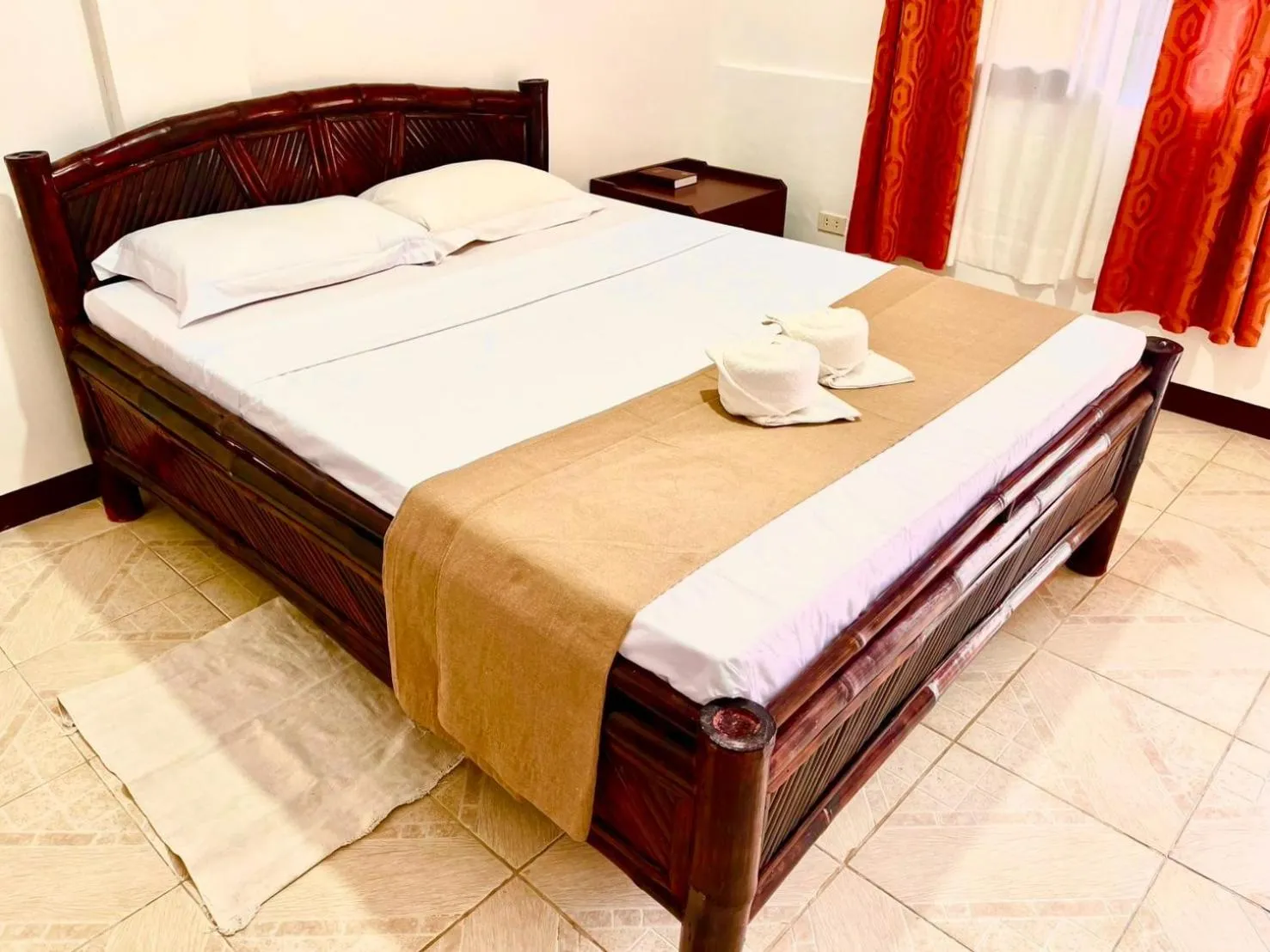 Bed in CHIISAI NATSU RESORT