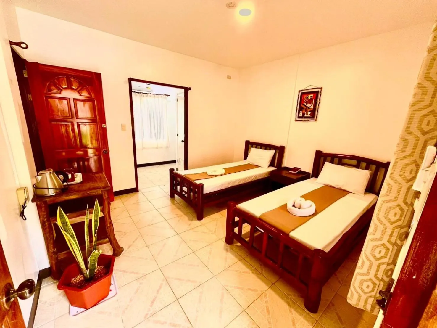 Bed in CHIISAI NATSU RESORT