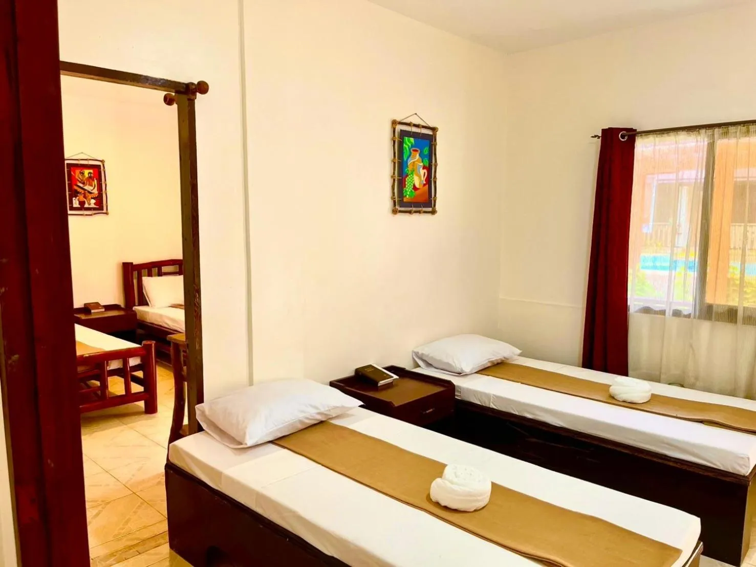 Bed in CHIISAI NATSU RESORT