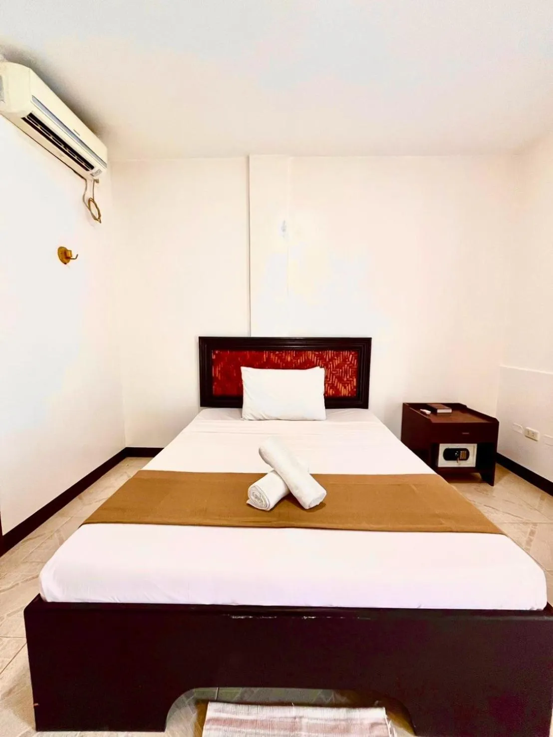 Bed in CHIISAI NATSU RESORT