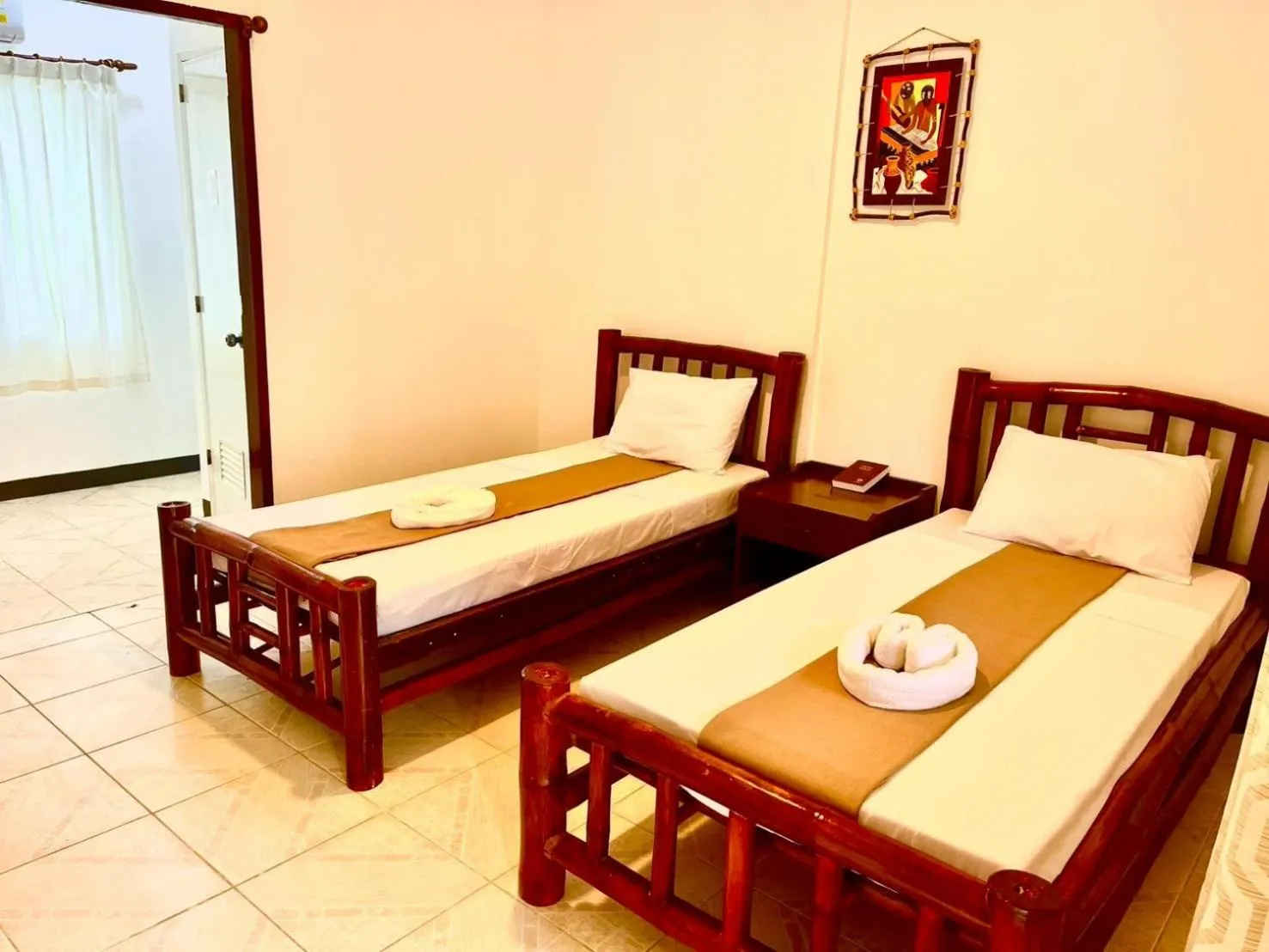 Bed in CHIISAI NATSU RESORT