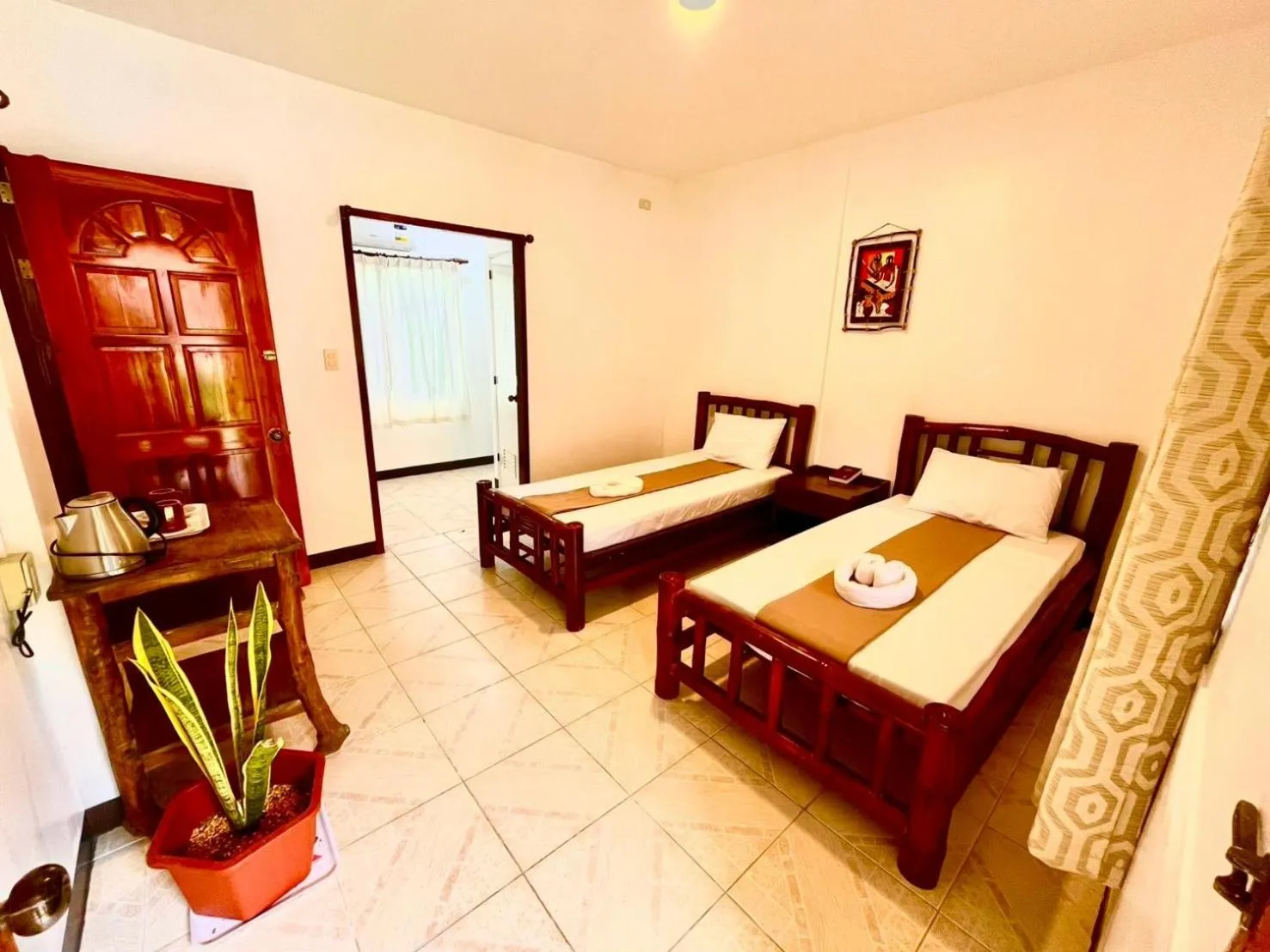 Bed in CHIISAI NATSU RESORT