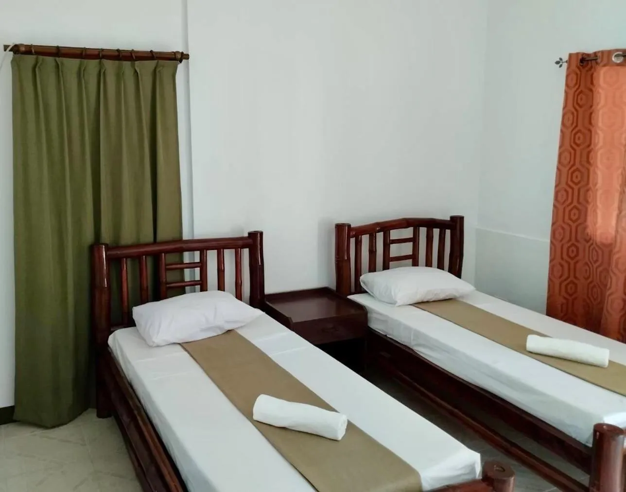 Bed in CHIISAI NATSU RESORT