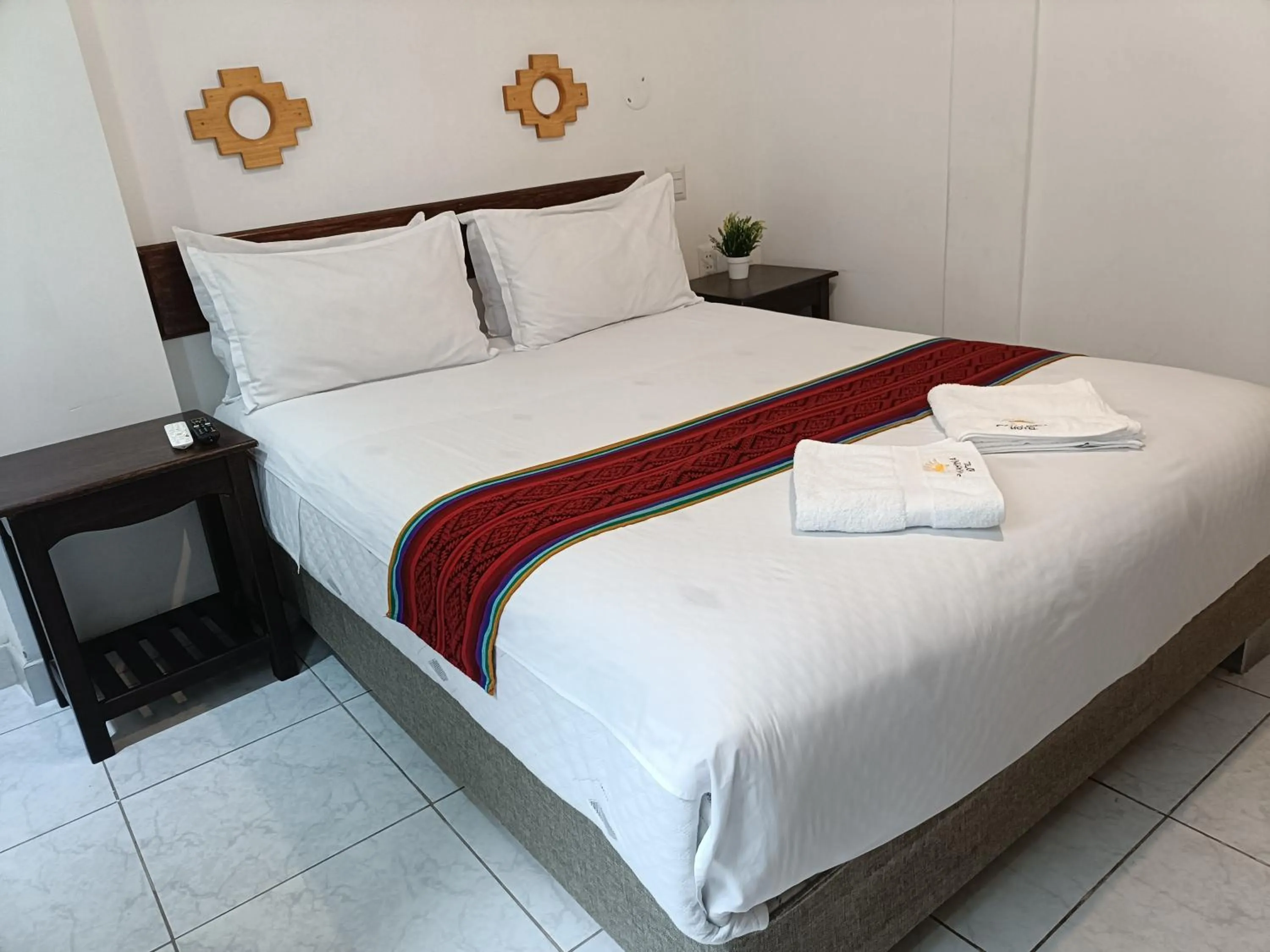 Bed in PAKARINA HOTEL