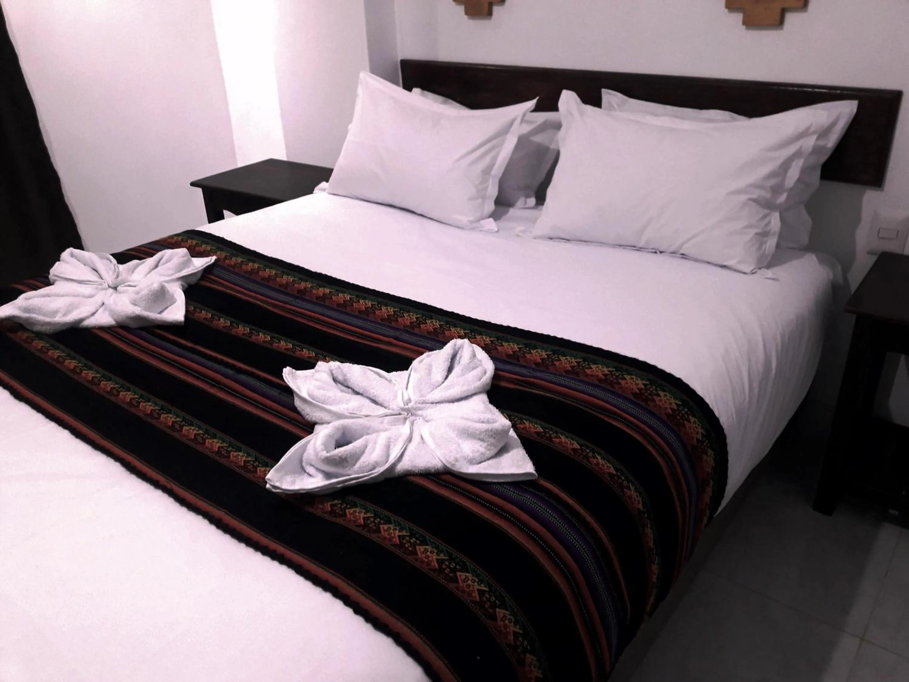 Bed in PAKARINA HOTEL