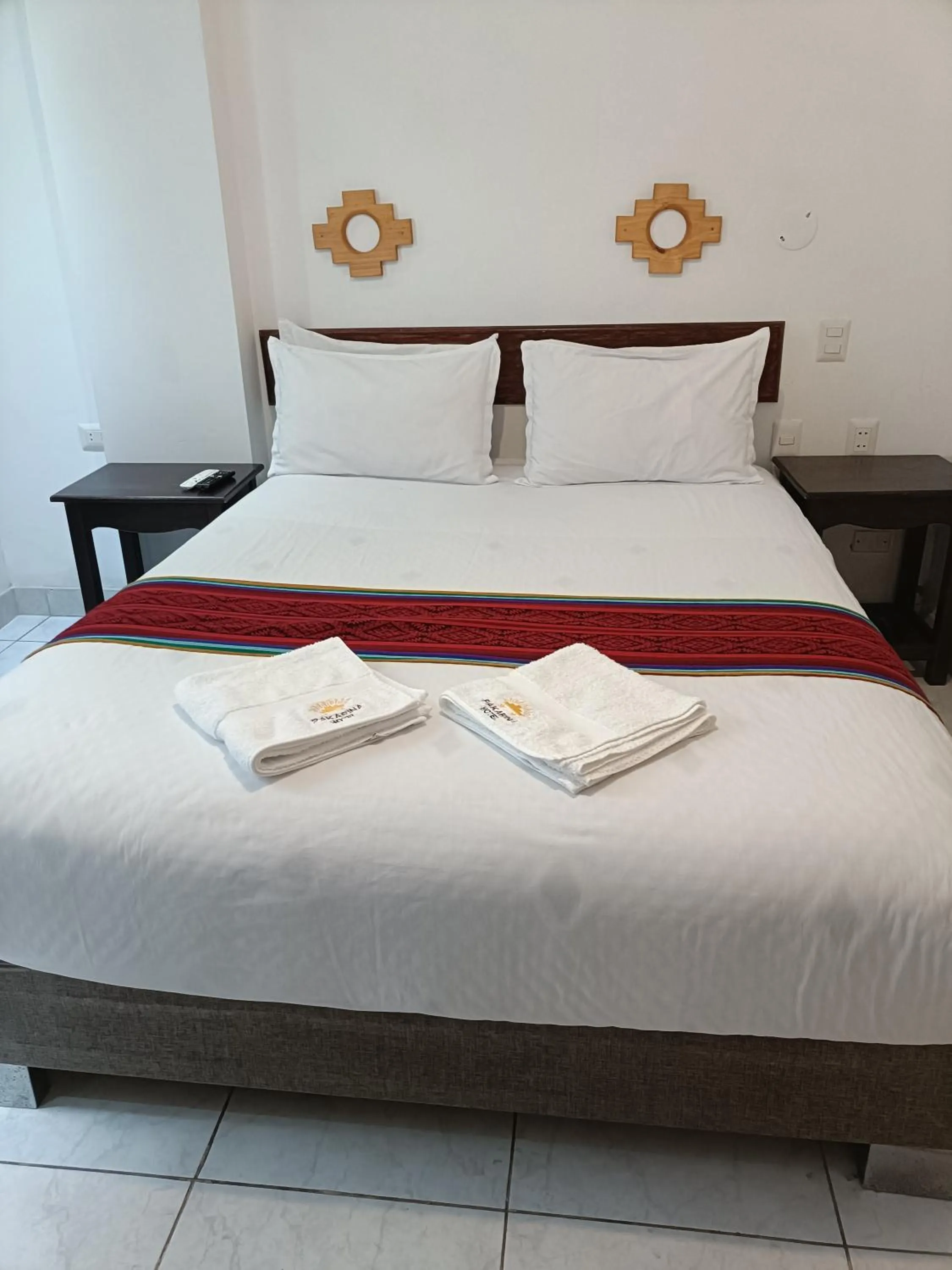 Bed in PAKARINA HOTEL