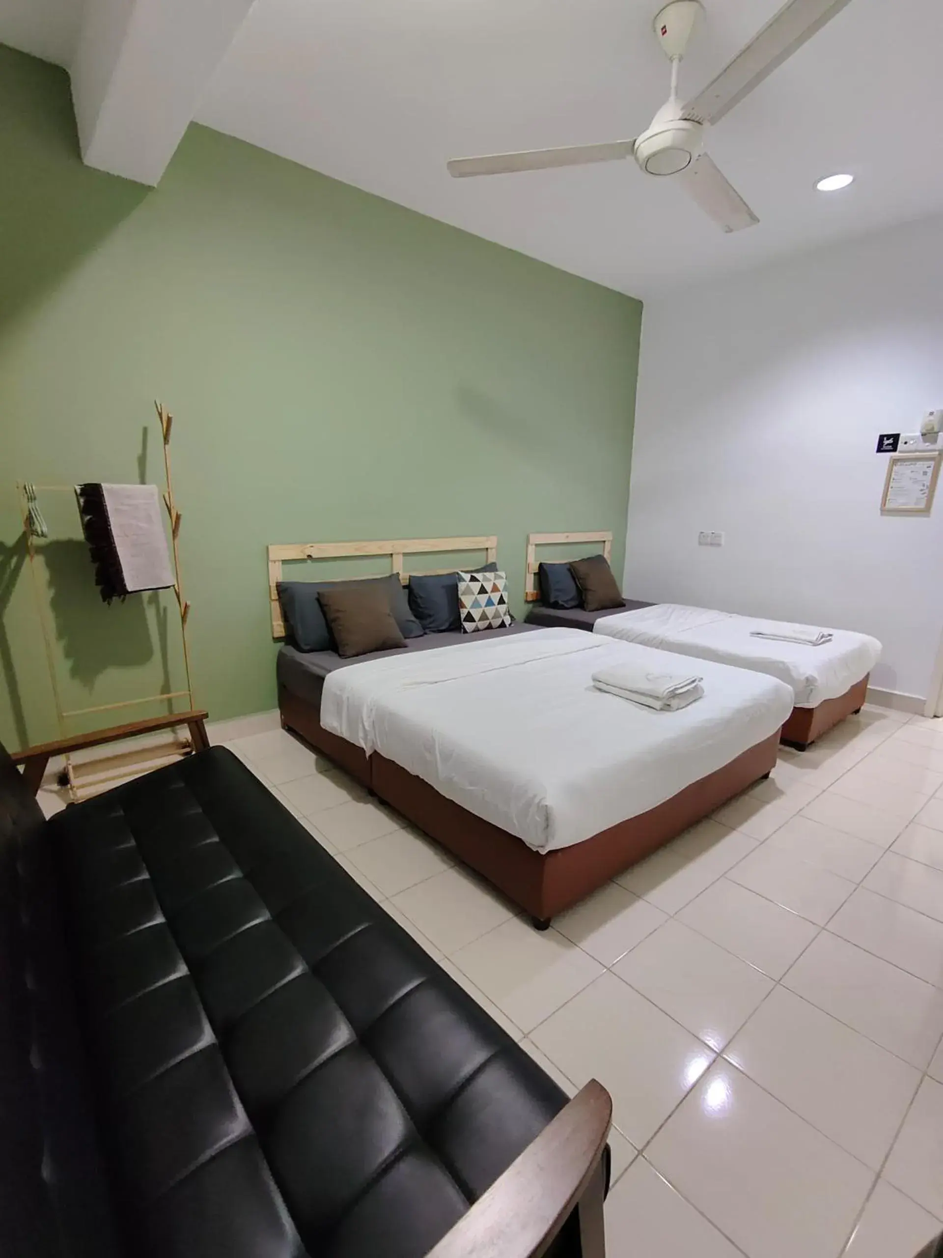 Bed in Suite Us Guesthouse Kubang Kerian Bed in Suite Us Guesthouse Kubang Kerian