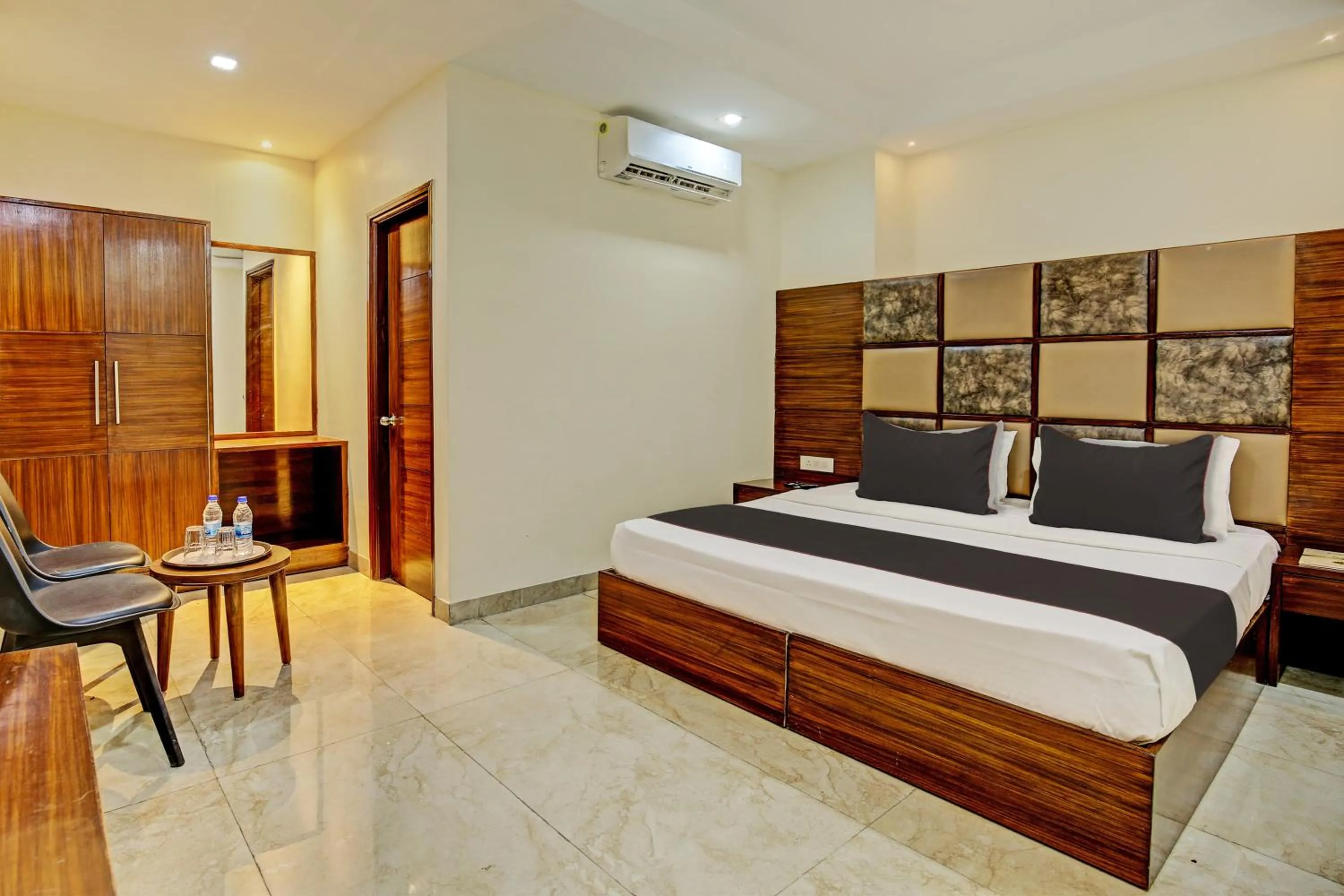 Bedroom, Bed in Super Townhouse Eastern View Formerly Vihaan Residency