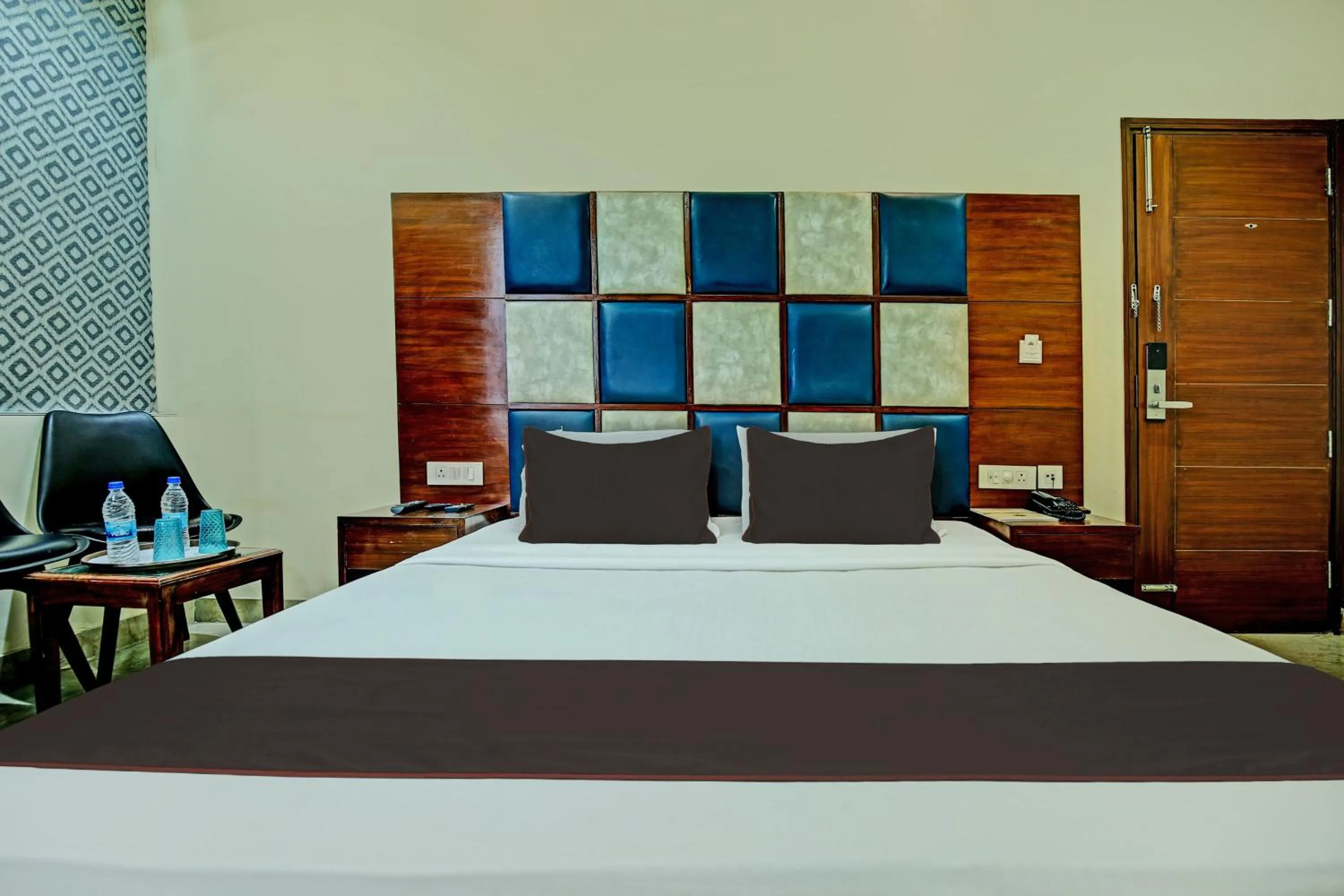 Bedroom, Bed in Super Townhouse Eastern View Formerly Vihaan Residency