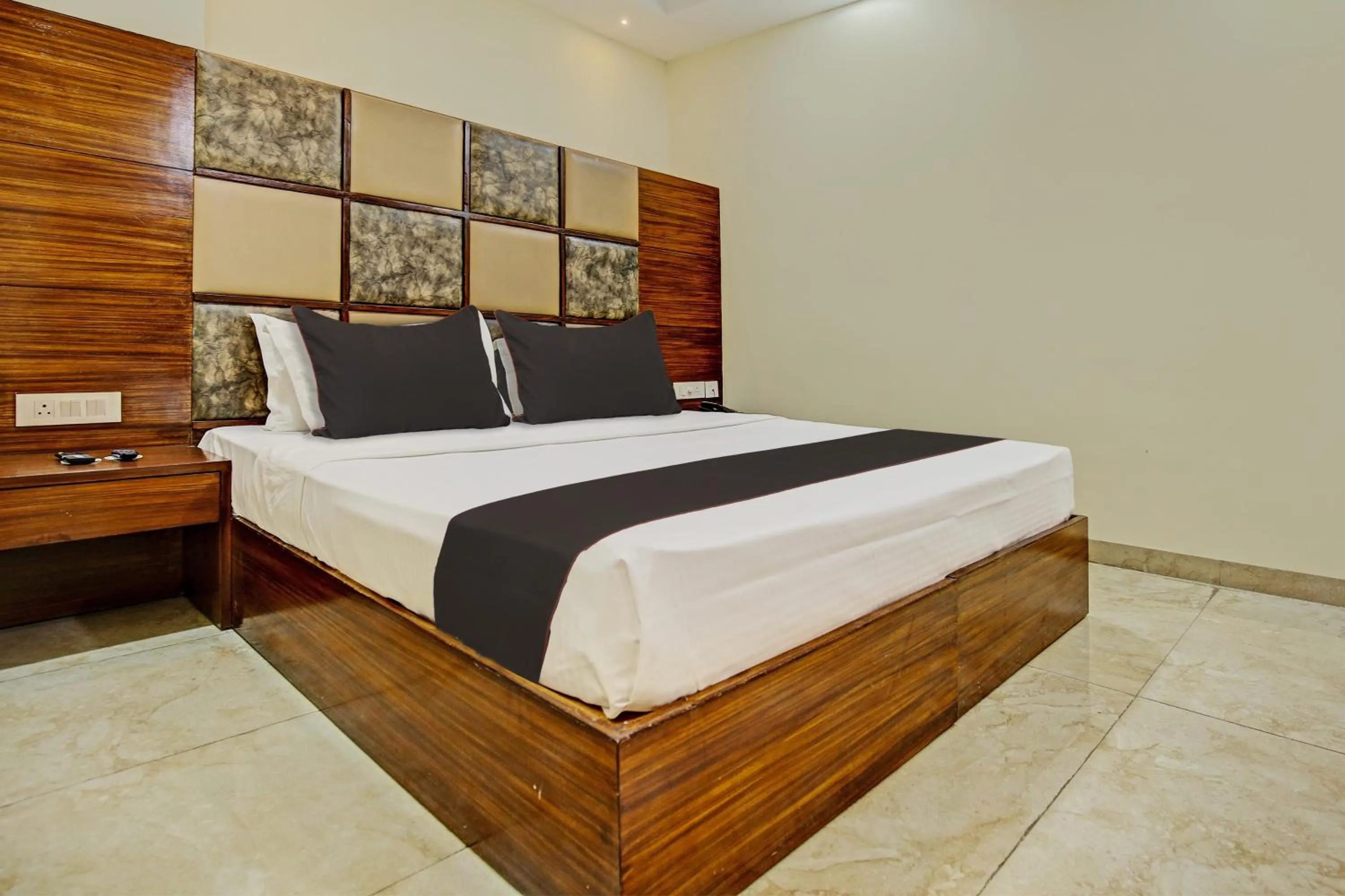 Bedroom, Bed in Super Townhouse Eastern View Formerly Vihaan Residency