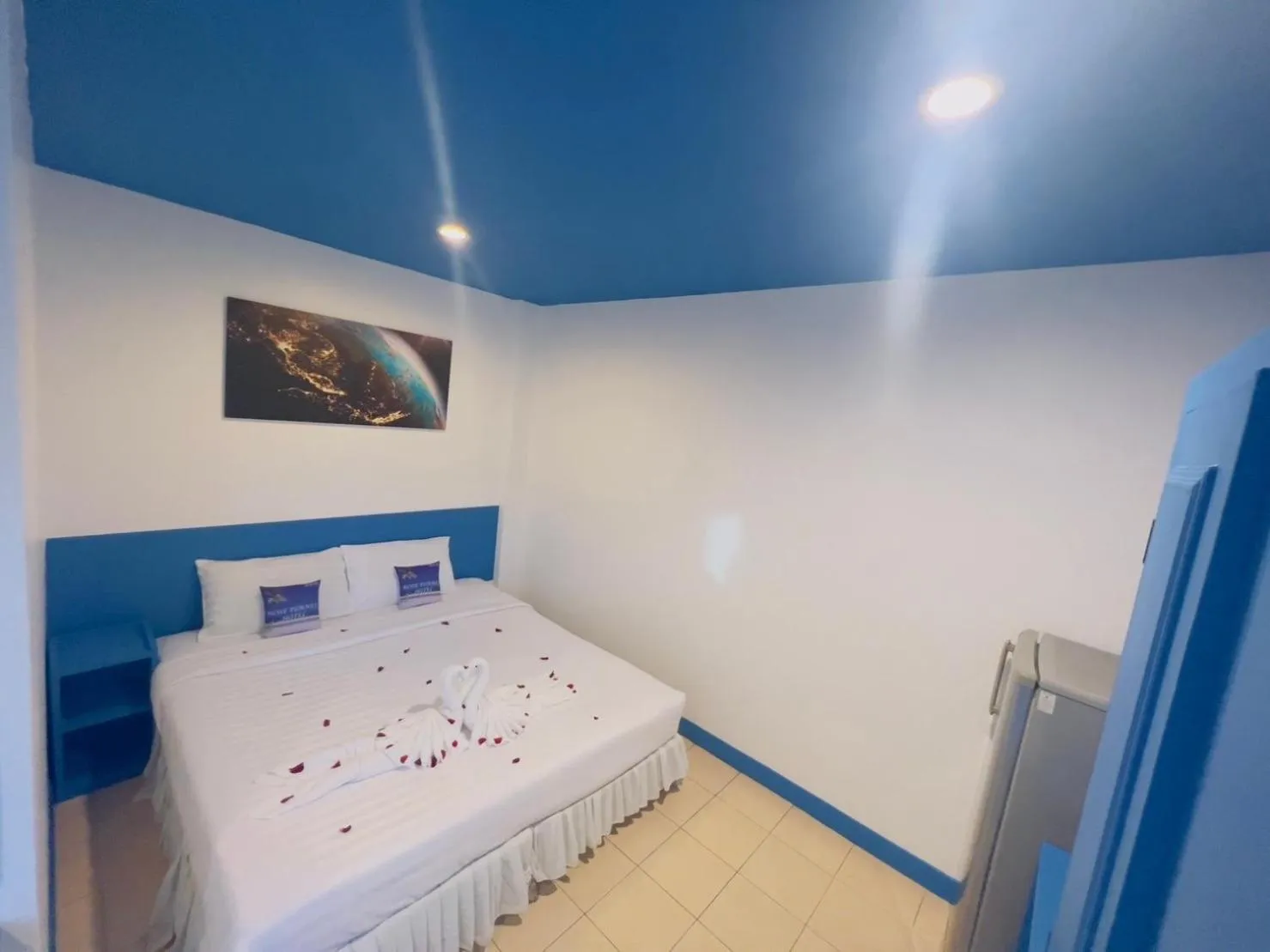 Bed in Blue Planet Hotel