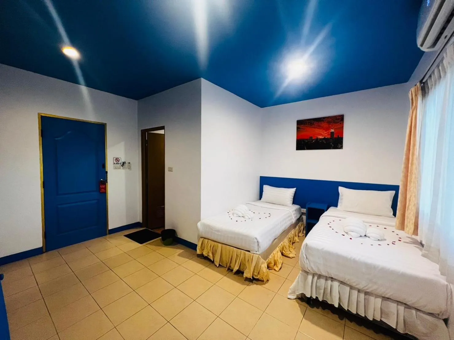 Bed in Blue Planet Hotel