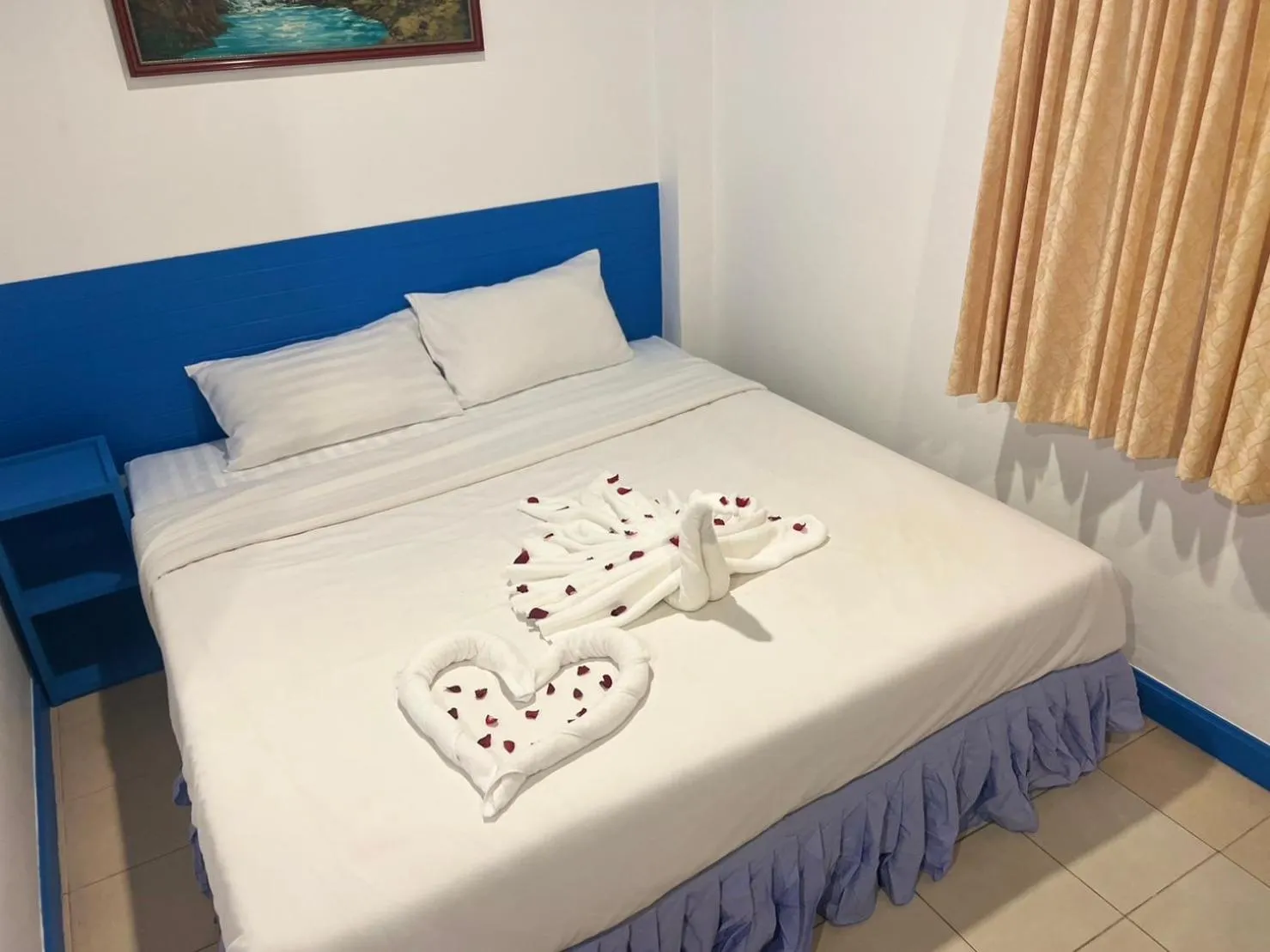 Bed in Blue Planet Hotel